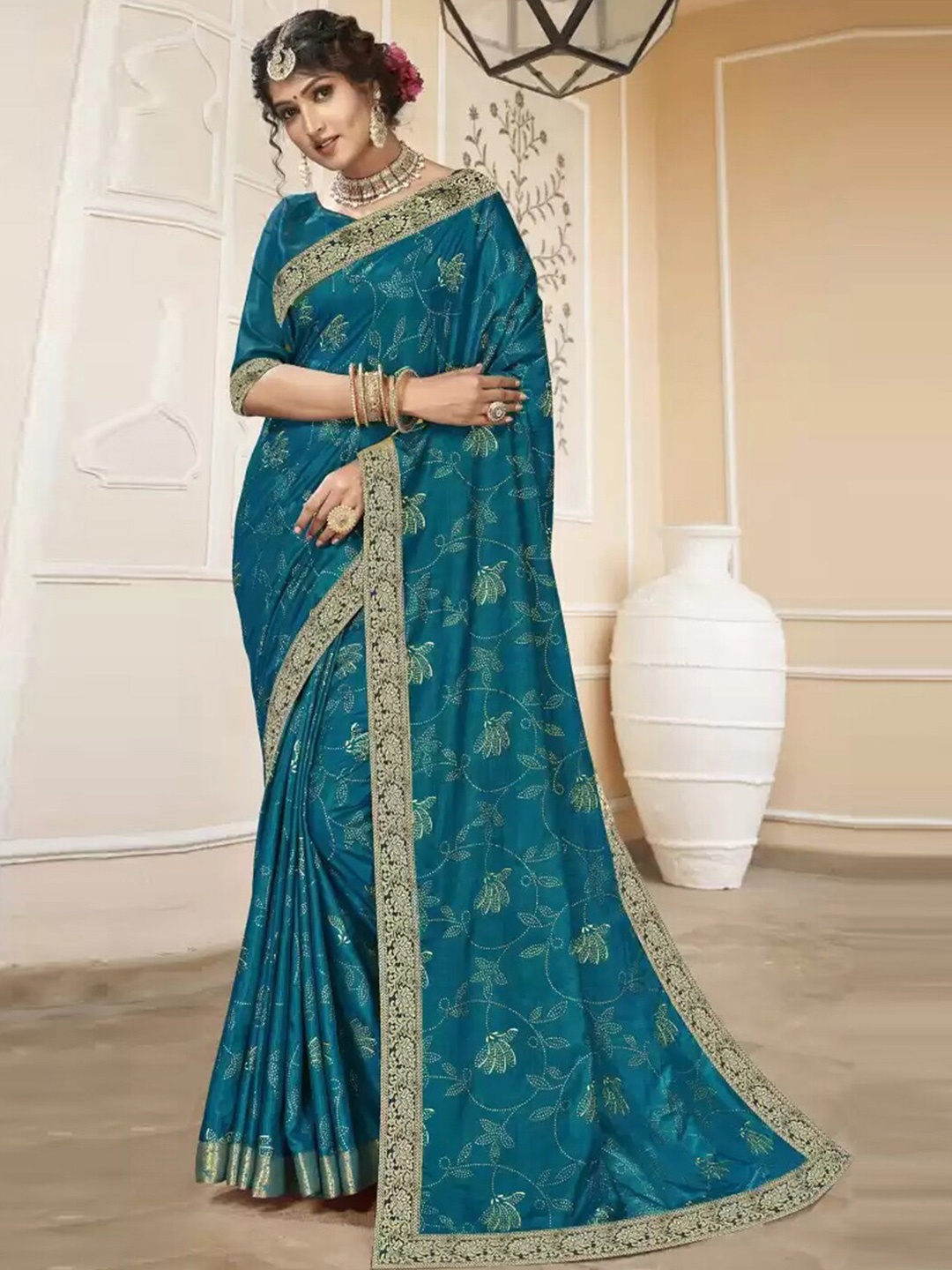 

Satrani Teal & Gold-Toned Ethnic Motifs Zari Saree