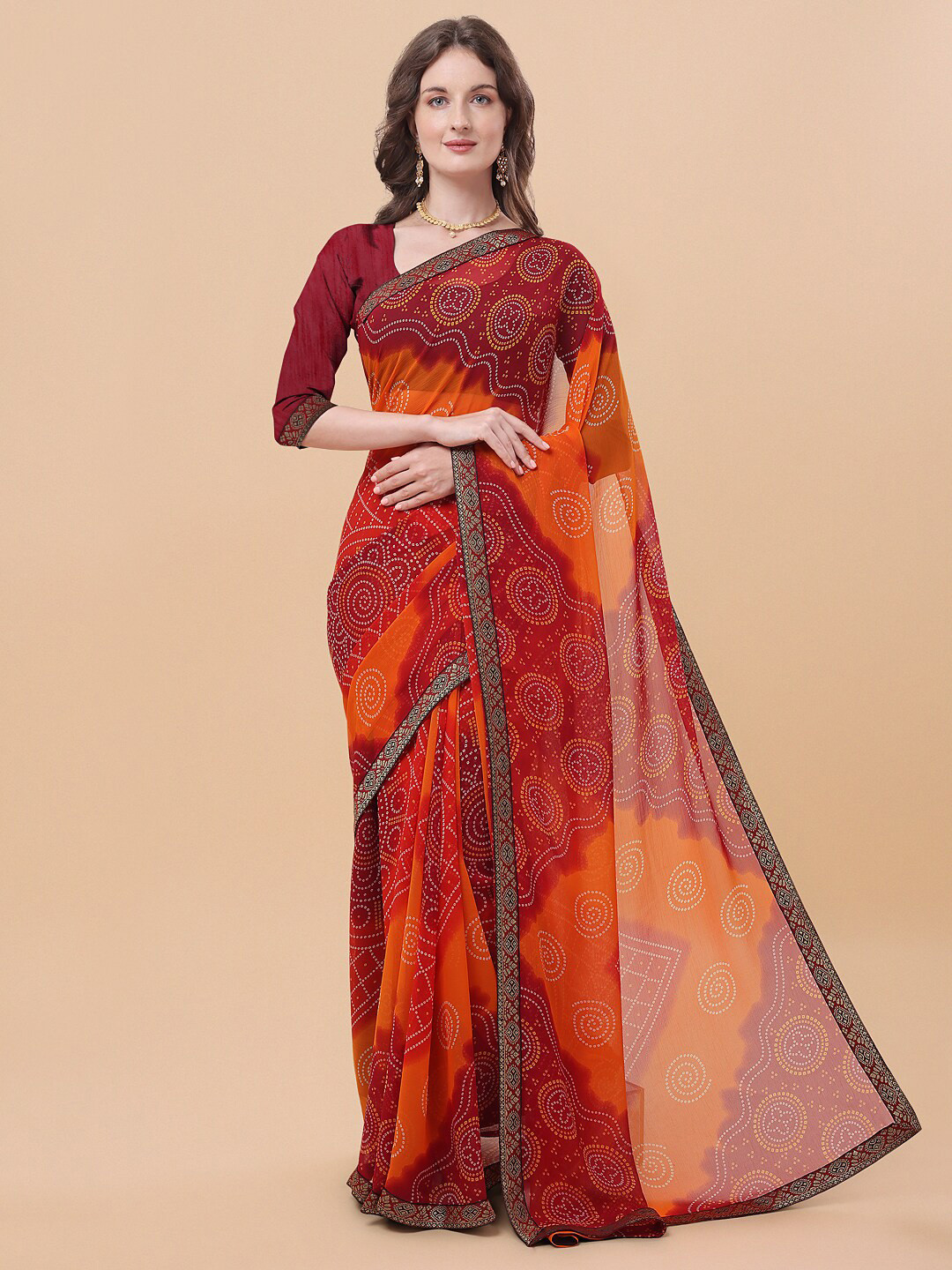 

Sangria Orange And Red Bandhani Print Lace Border Pure Chiffon Saree