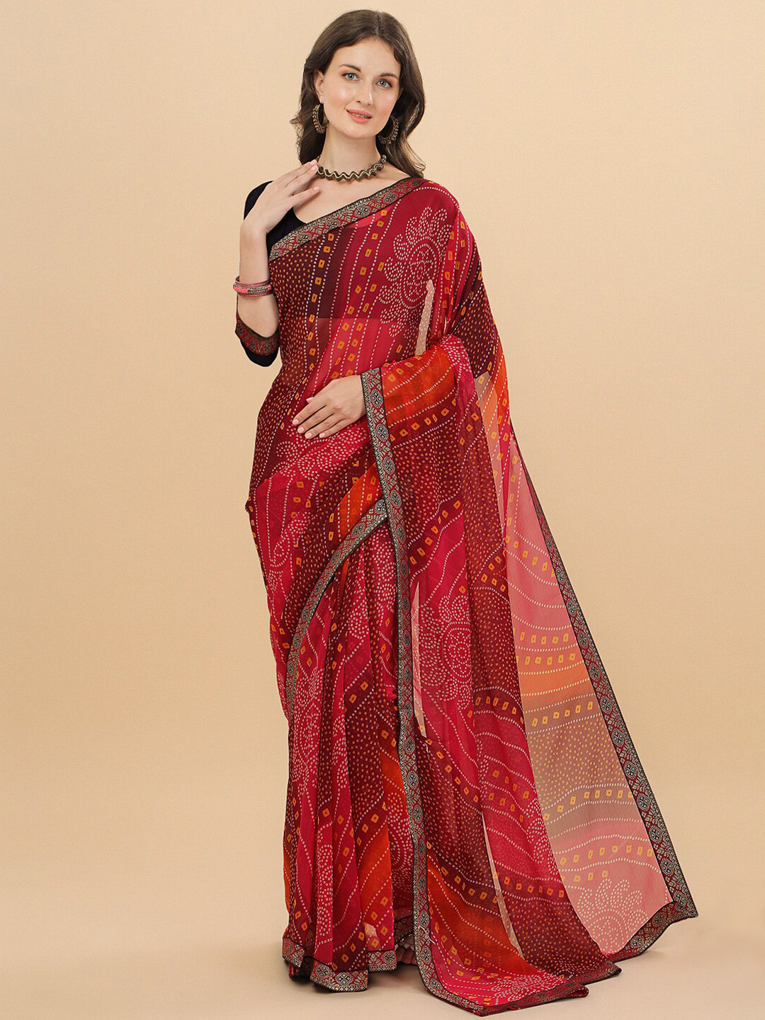 

Sangria Pink & Orange Bandhani Pure Chiffon Saree