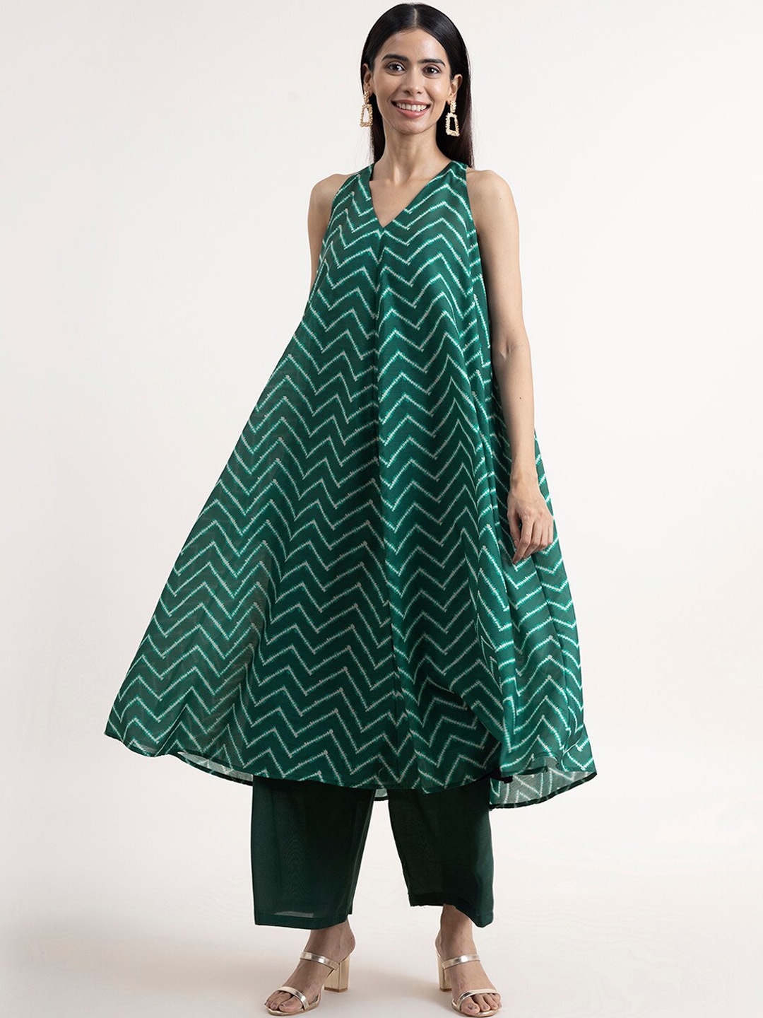 

Pink Fort Women Green Printed Kurta with Palazzos