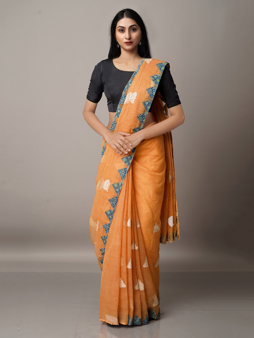 

Unnati Silks Orange & White Ethnic Motifs Patchwork Supernet Patola Saree