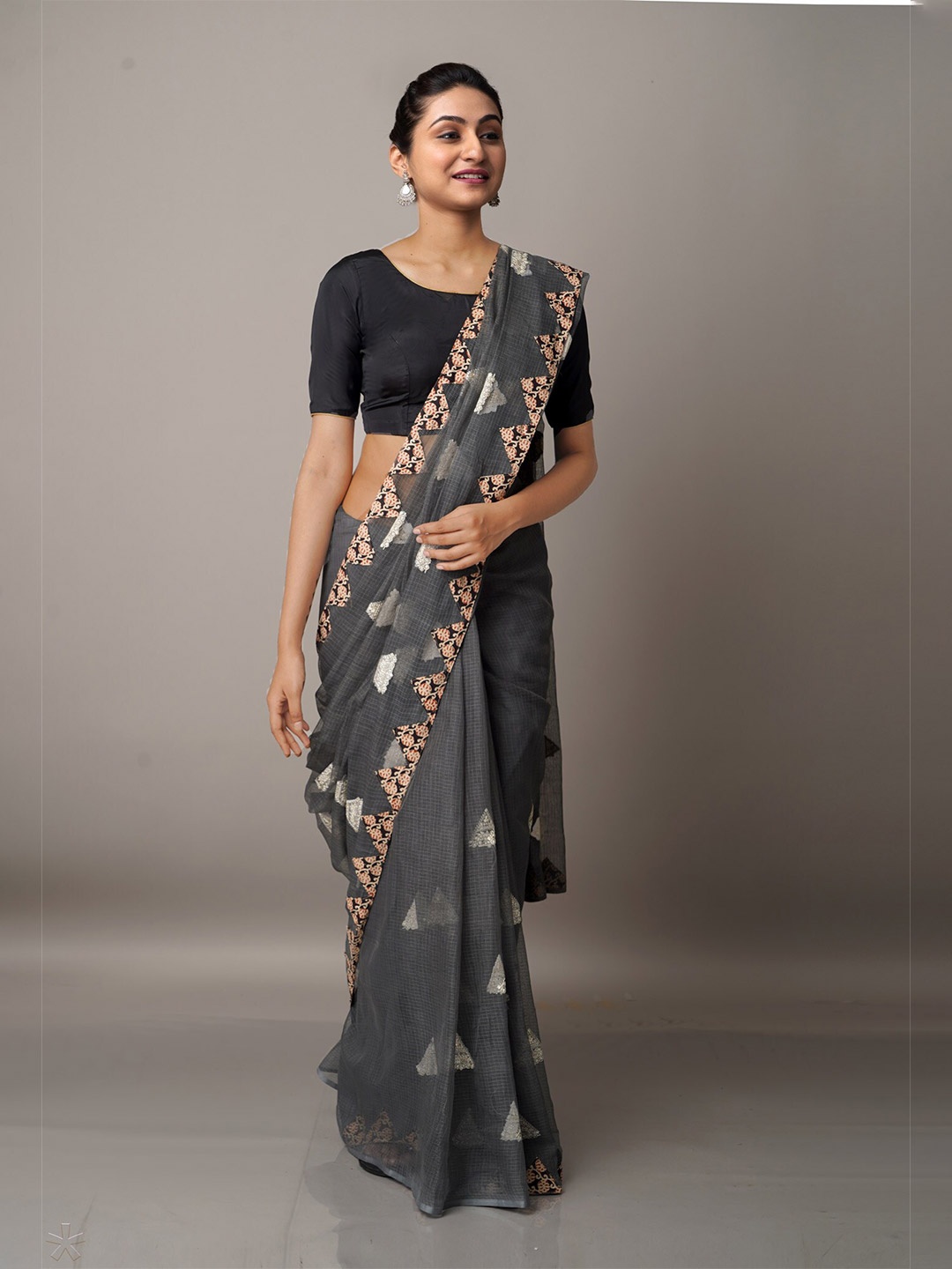 

Unnati Silks Grey & White Patchwork Embroidered Supernet Patola Saree