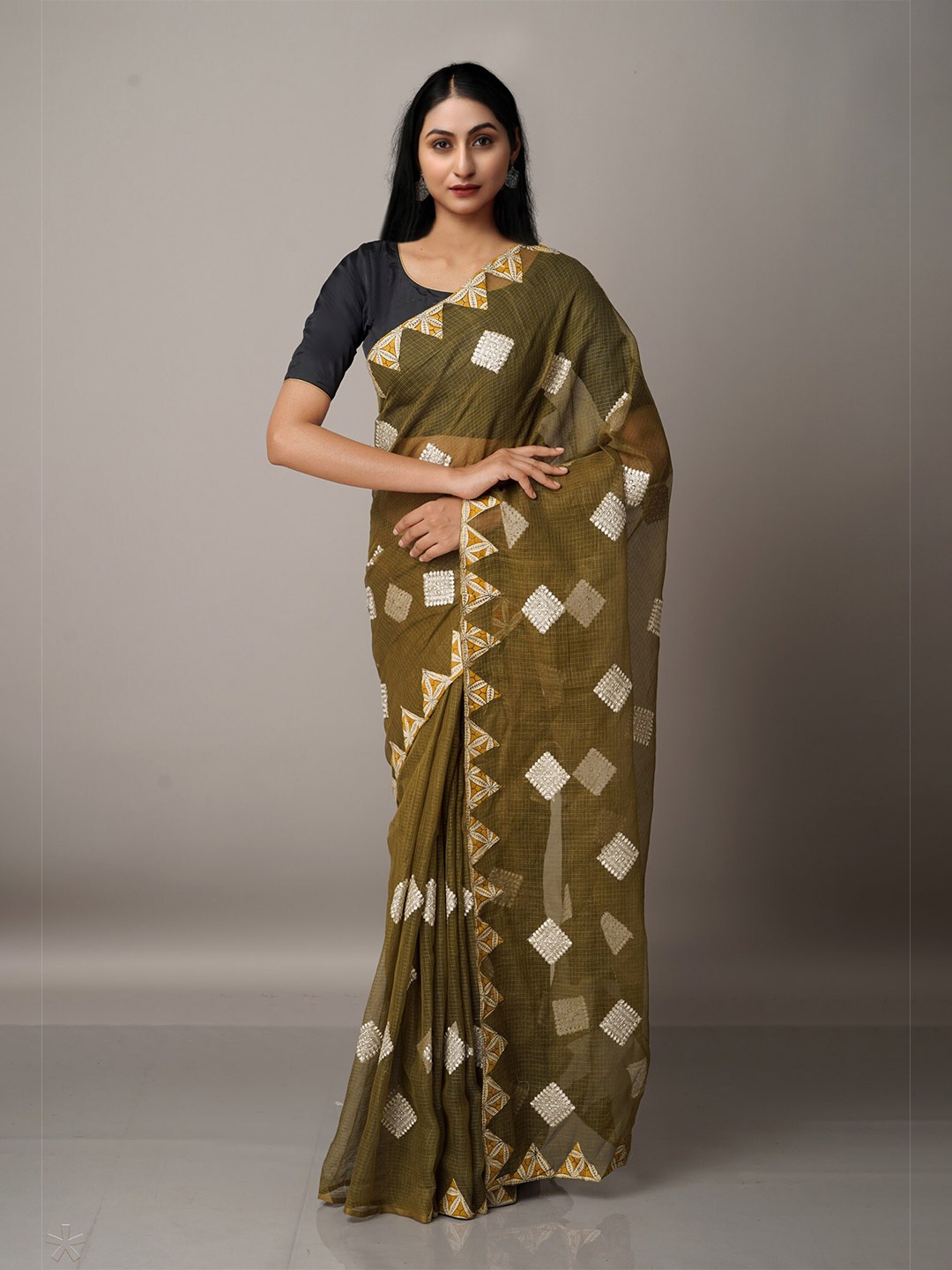 

Unnati Silks Green & Yellow Ethnic Motifs Patchwork Supernet Patola Saree