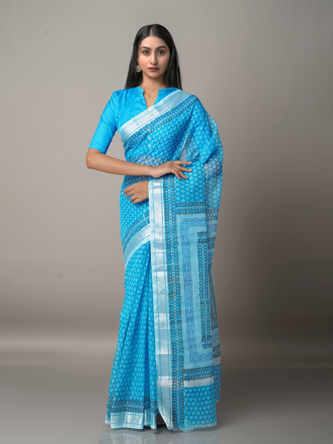 

Unnati Silks Blue & Silver-Toned Floral Zari Pure Cotton Kota Saree
