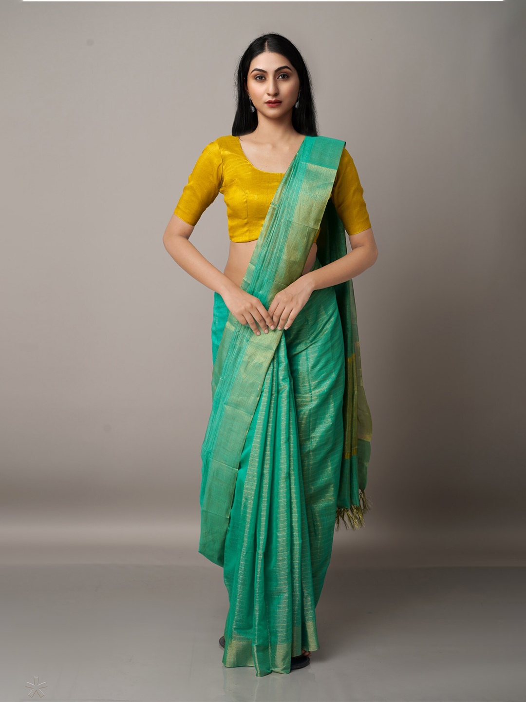 

Unnati Silks Green & Gold-Toned Striped Zari Silk Cotton Chanderi Saree