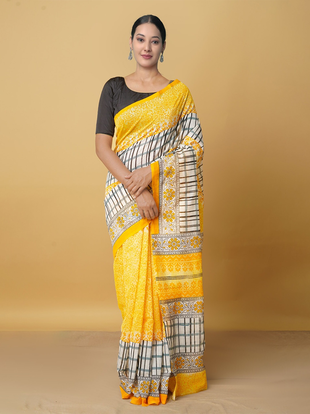 

Unnati Silks White & Yellow Floral Block Print Saree