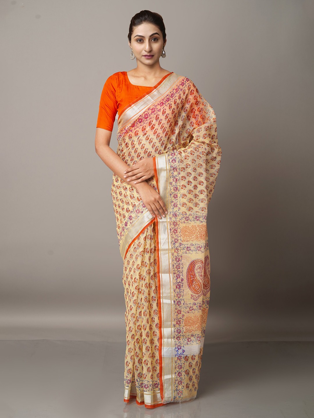 

Unnati Silks Cream-Coloured & Silver-Toned Ethnic Motifs Zari Pure Cotton Kota Saree
