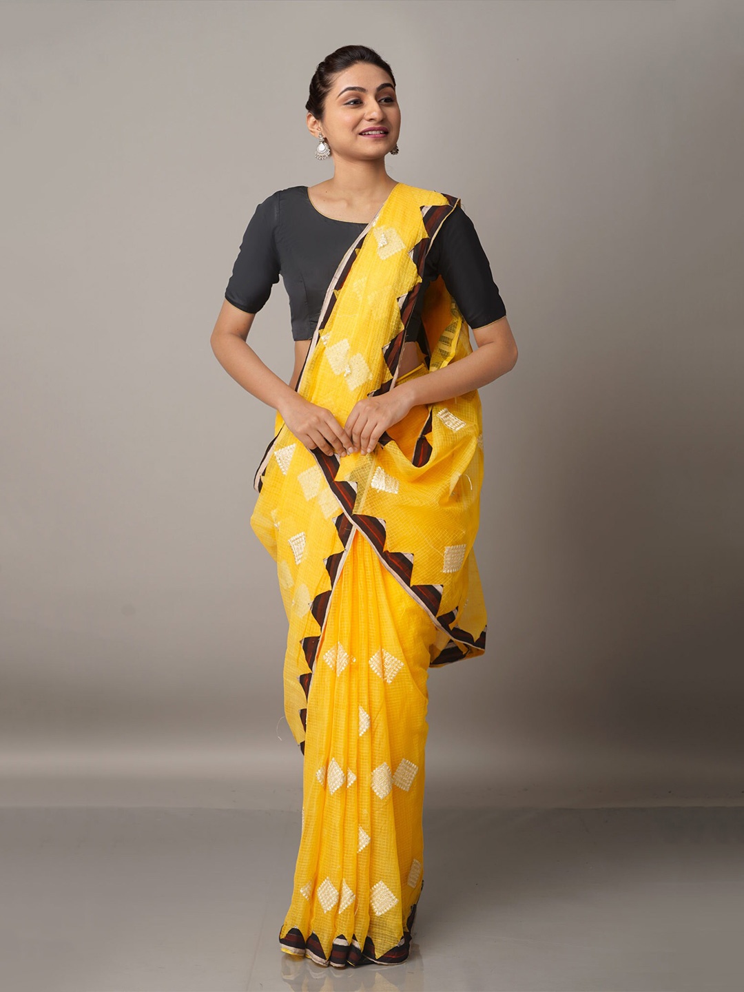 

Unnati Silks Yellow & White Embroidered Supernet Saree