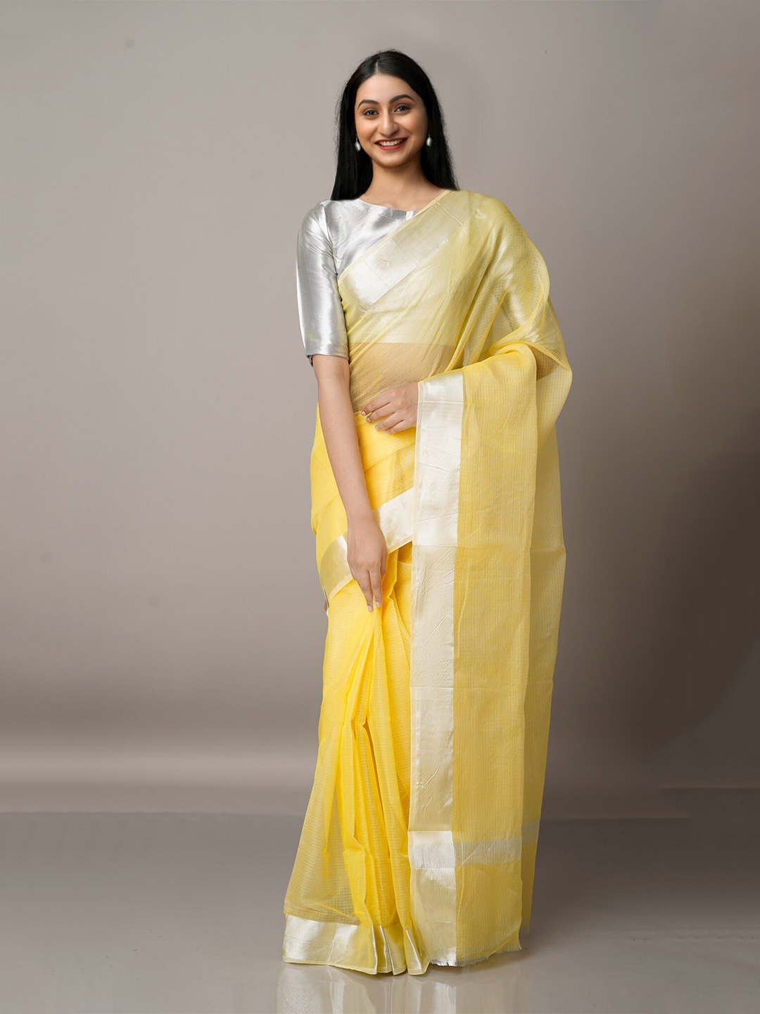 

Unnati Silks Yellow & Silver-Toned Woven Design Zari Pure Cotton Kota Saree