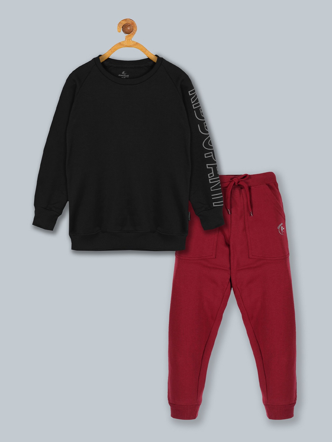 

KiddoPanti Boys Black & Magenta Printed T-shirt & Trouser Clothing Set