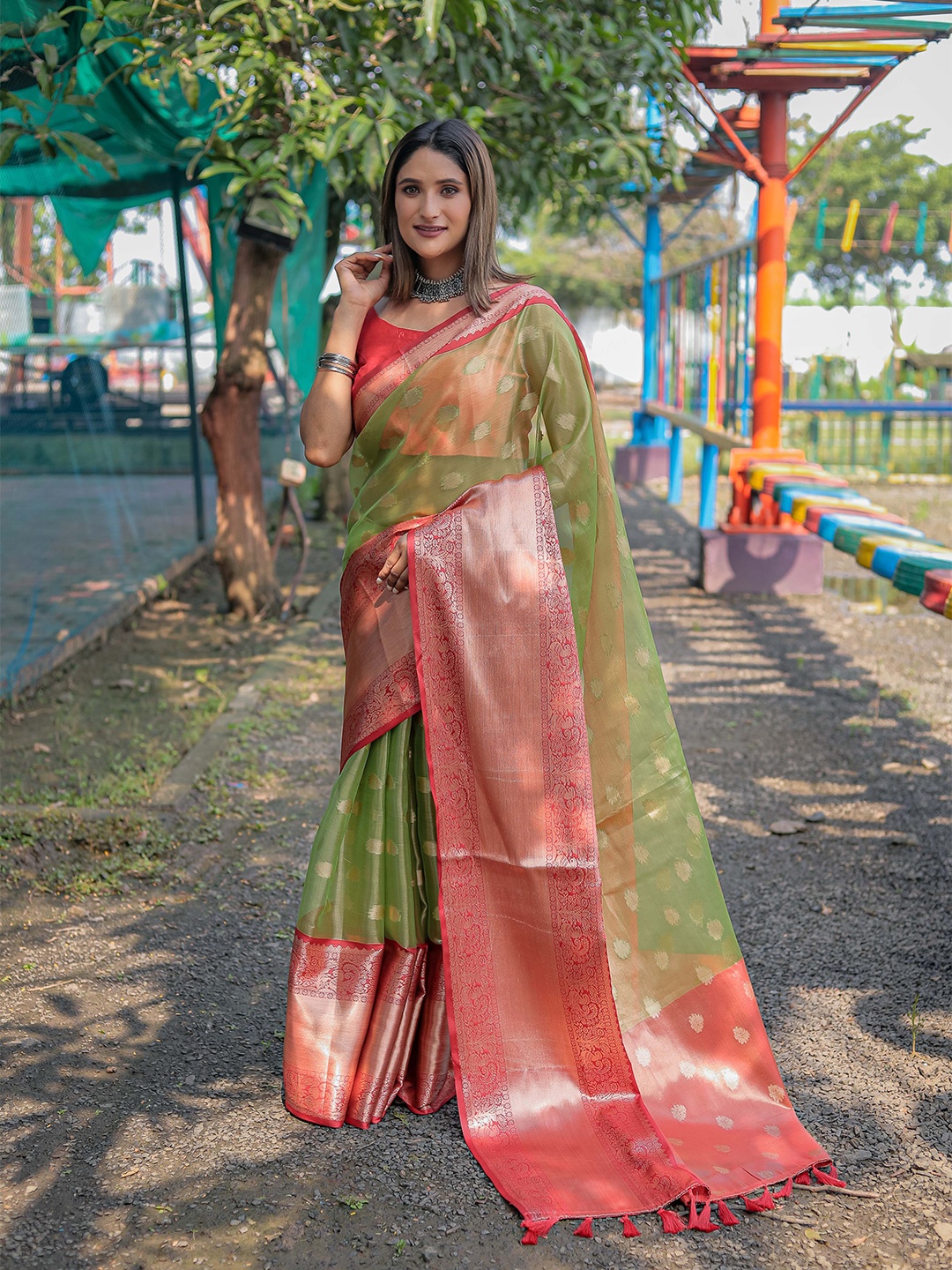 

Mitera Green & Pink Woven Design Zari Organza Kanjeevaram Saree