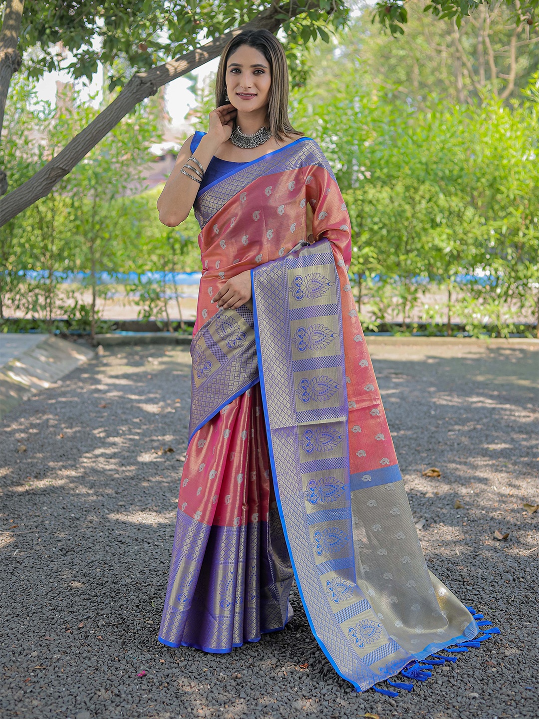 

Mitera Peach-Coloured & Blue Woven Design Zari Silk Blend Kanjeevaram Saree