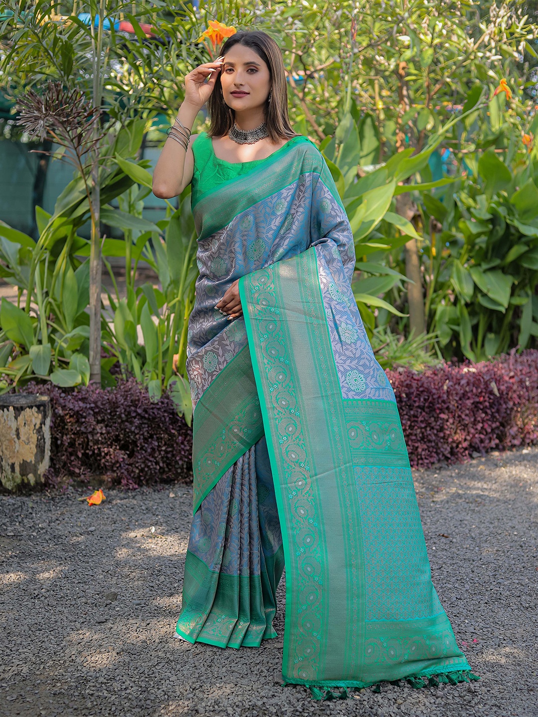 

Mitera Sea Green & Green Woven Design Zari Silk Blend Kanjeevaram Saree