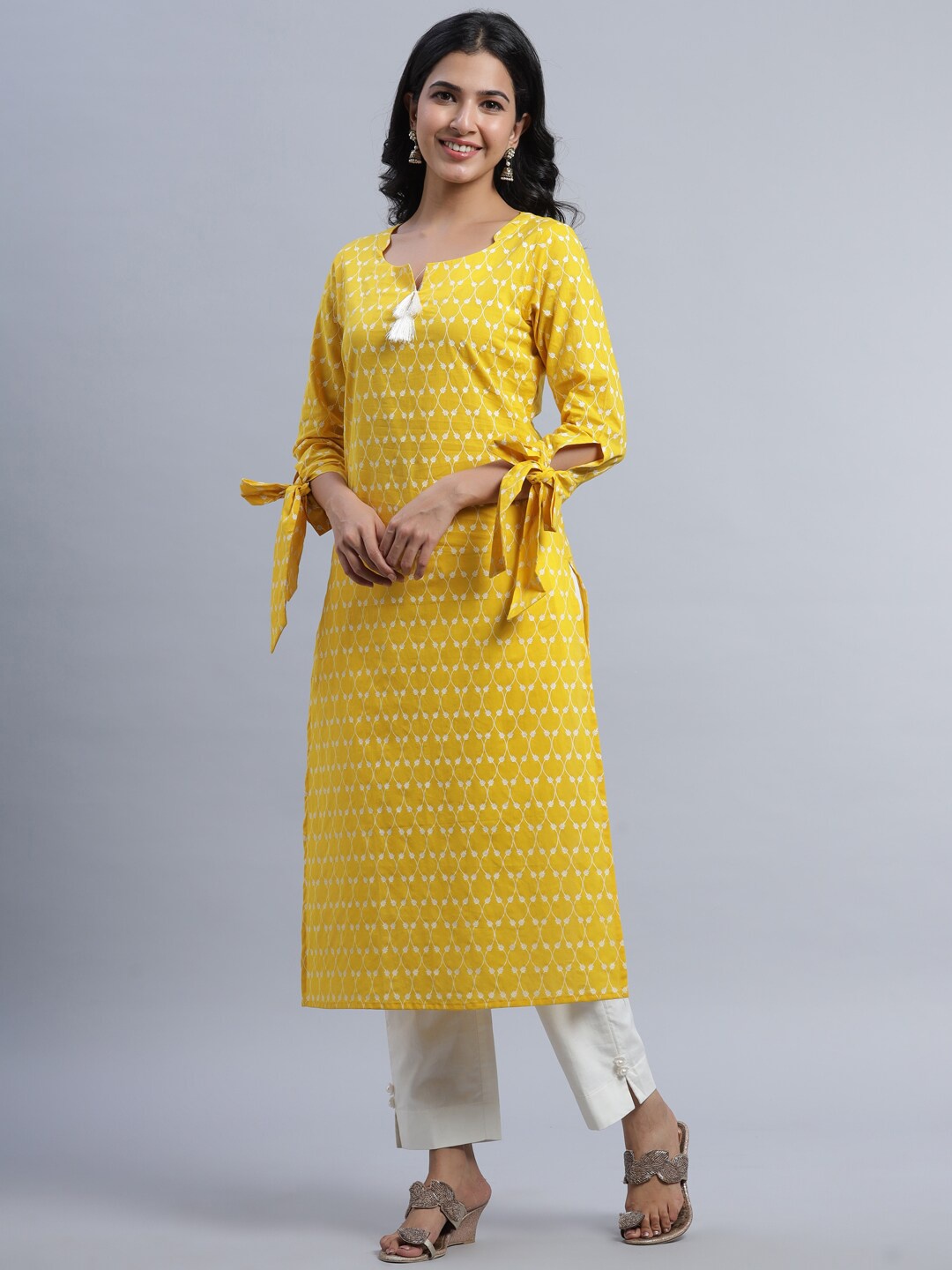 

Indian Virasat Women Yellow Ethnic Motifs Printed Keyhole Neck Flared Sleeves Thread Work Kurta