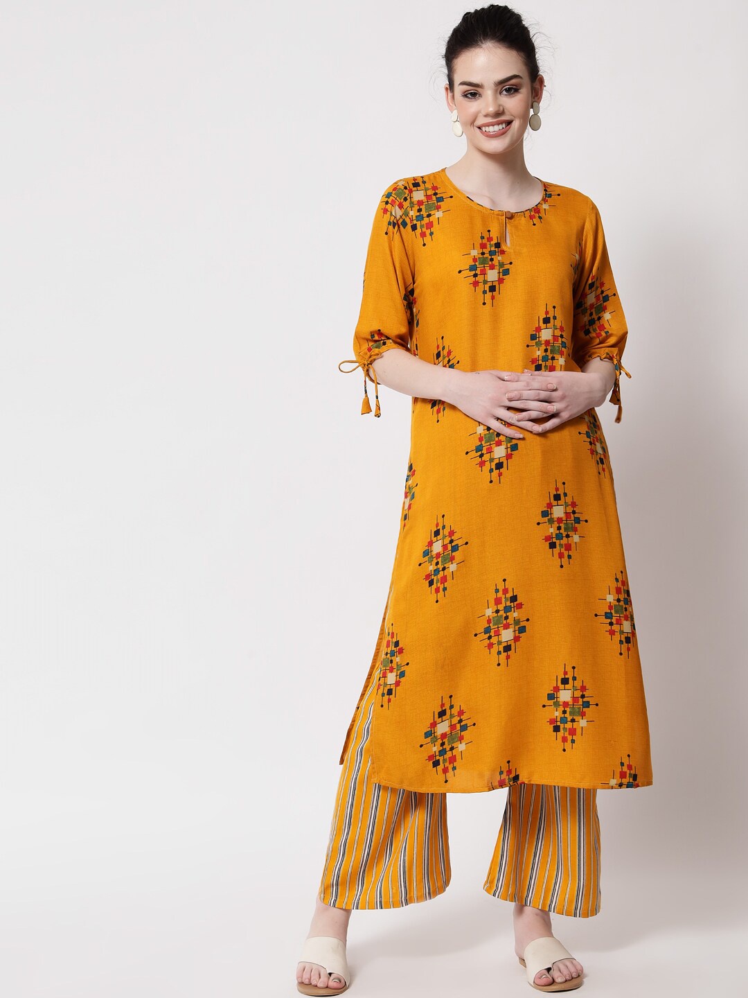 

Aujjessa Women Mustard Yellow Printed Viscose Rayon Straight Kurta with Palazzos