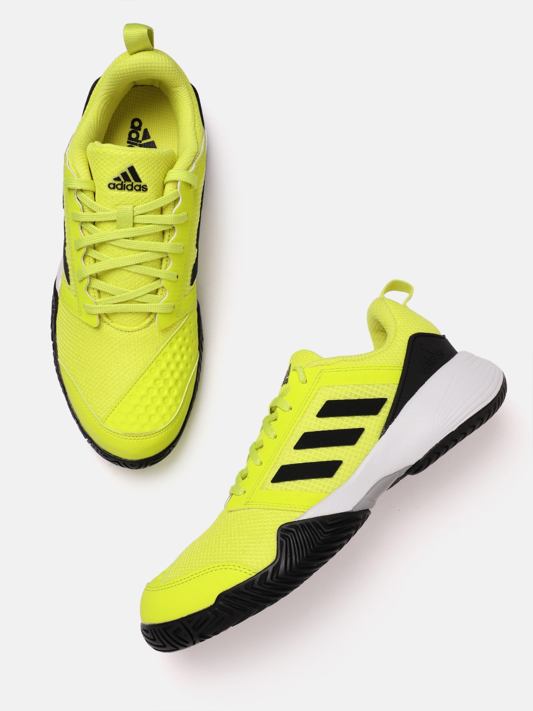 

ADIDAS Men Woven Design Stin TNS 23 Tennis Shoes, Yellow