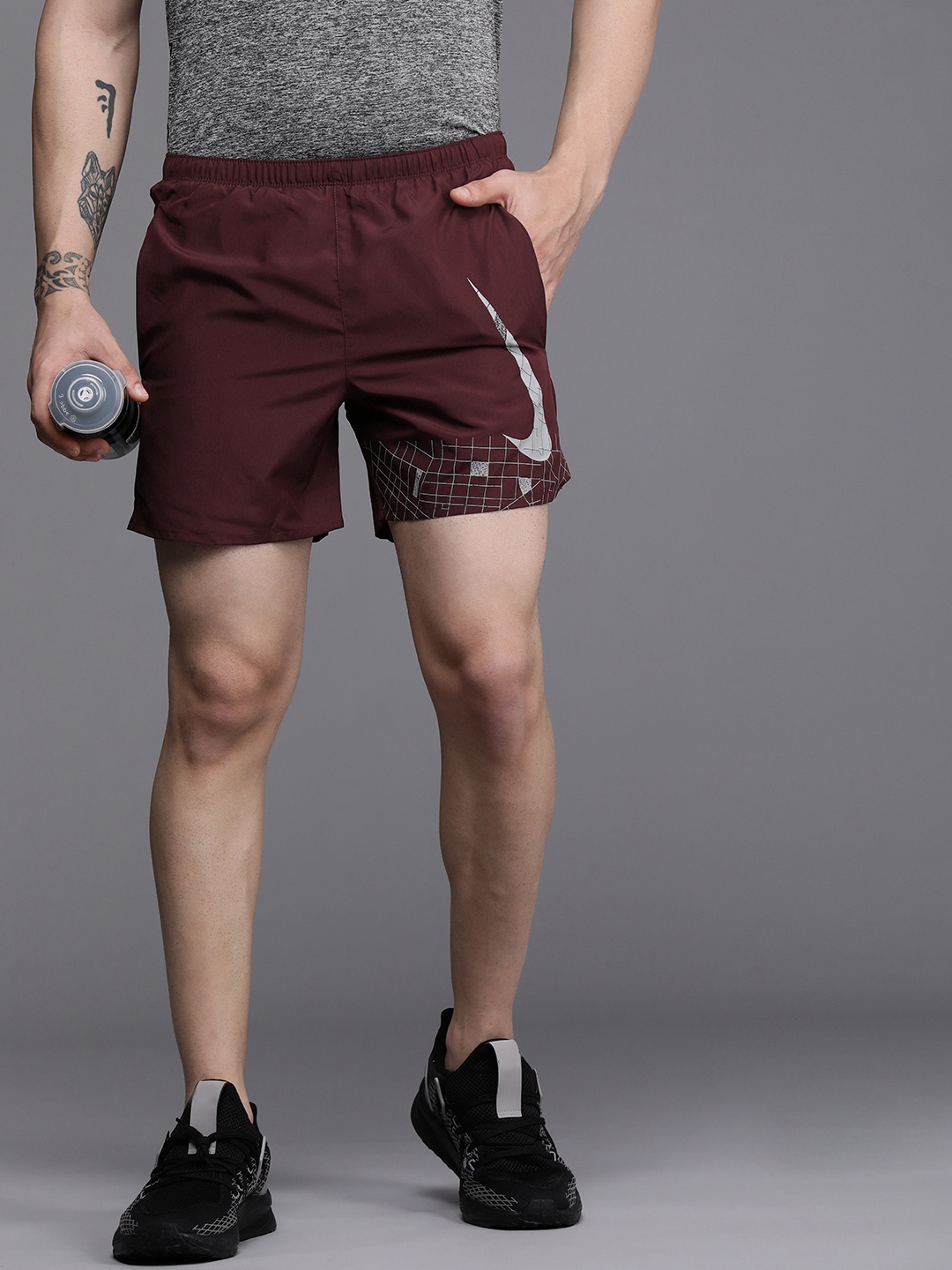 

Nike Men Standard Fit Logo Printed DVN CHLGR Dri-FIT Sustainable Running Shorts, Burgundy