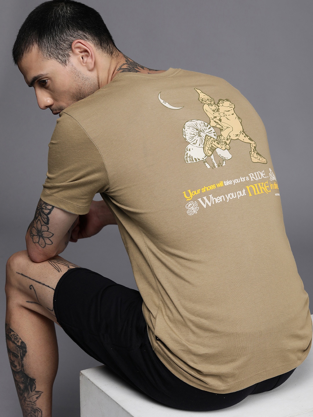 

Nike Men Khaki Graphic Printed Pure Cotton Applique T-shirt
