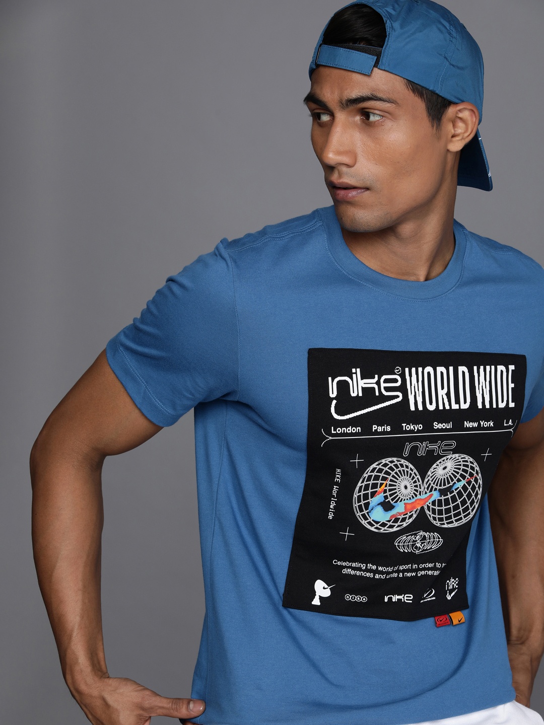

Nike Men Blue Pure Cotton Brand Logo Printed Pure Cotton T-shirt