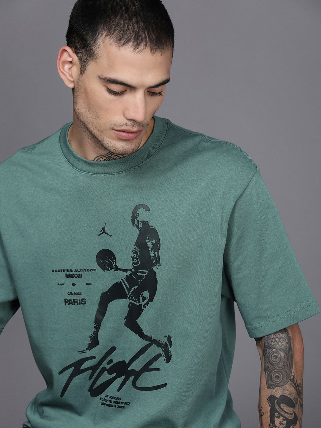 

Nike Men Teal Green Printed Pure Cotton Basketball T-shirt