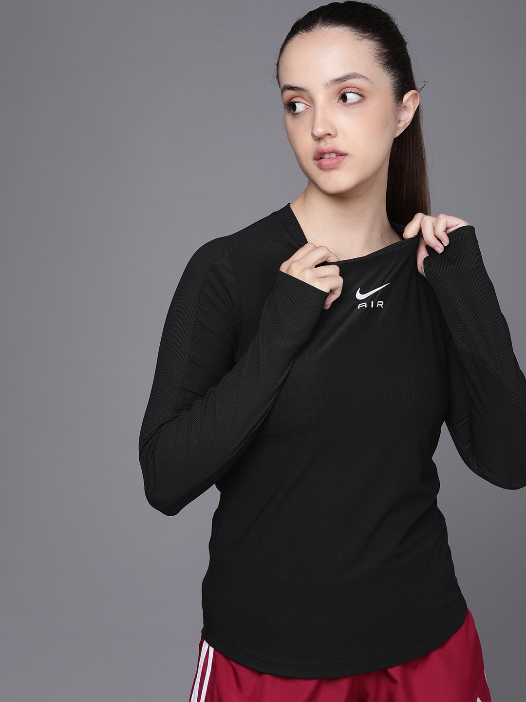 

Nike Women Solid Dri-Fit Slim Fit Regular Top, Black