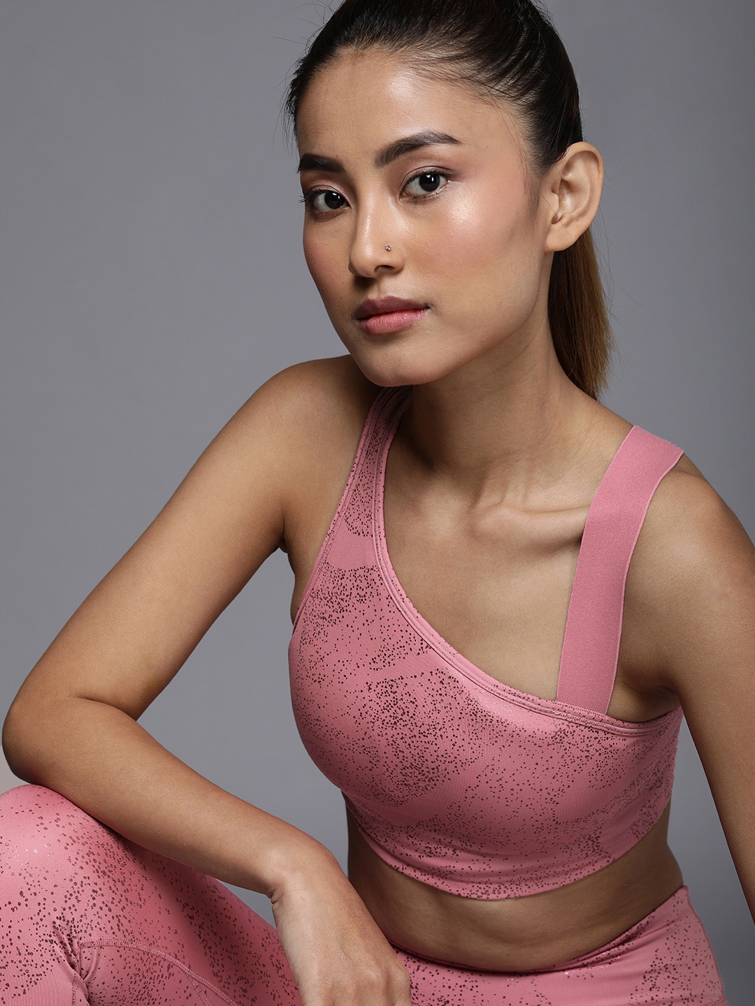 

Nike Swoosh Women's Medium-Support Asymmetrical Padded Sports Bra, Pink