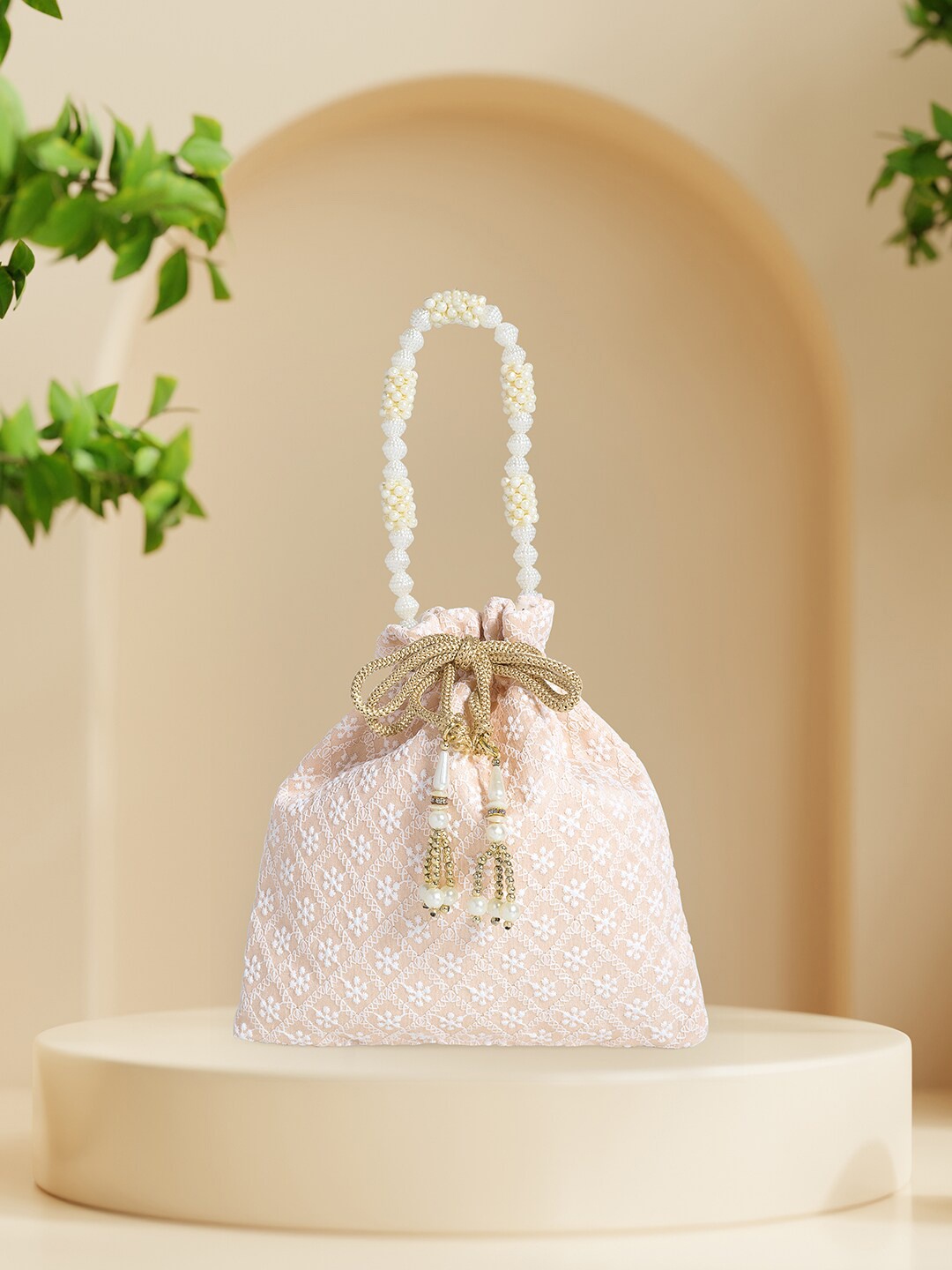 

Golden Peacock Women Nude & Off White Embroidered Fabric Potli Clutch