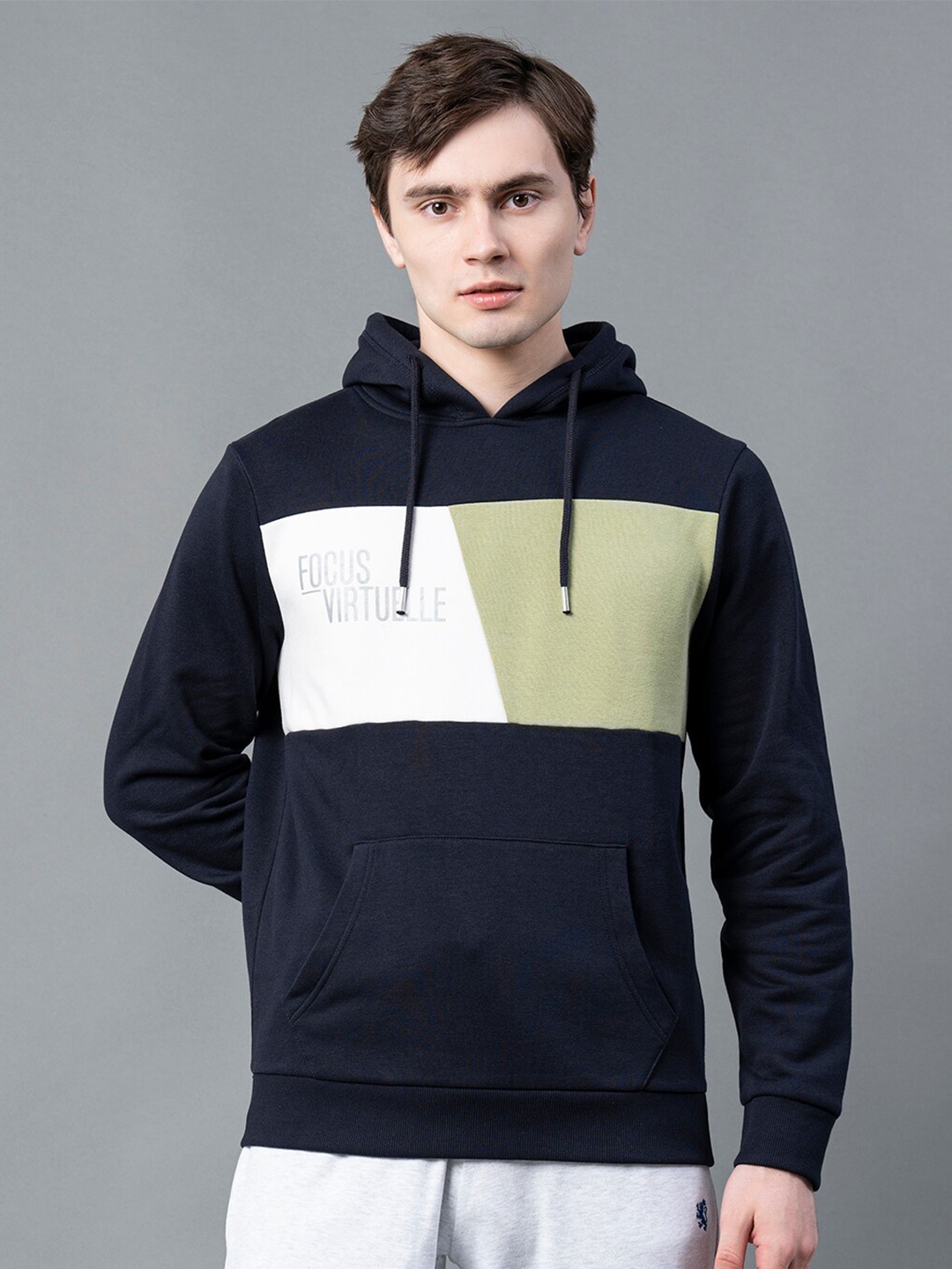 

Red Tape Men Navy Blue Colourblocked Hooded Sweatshirt