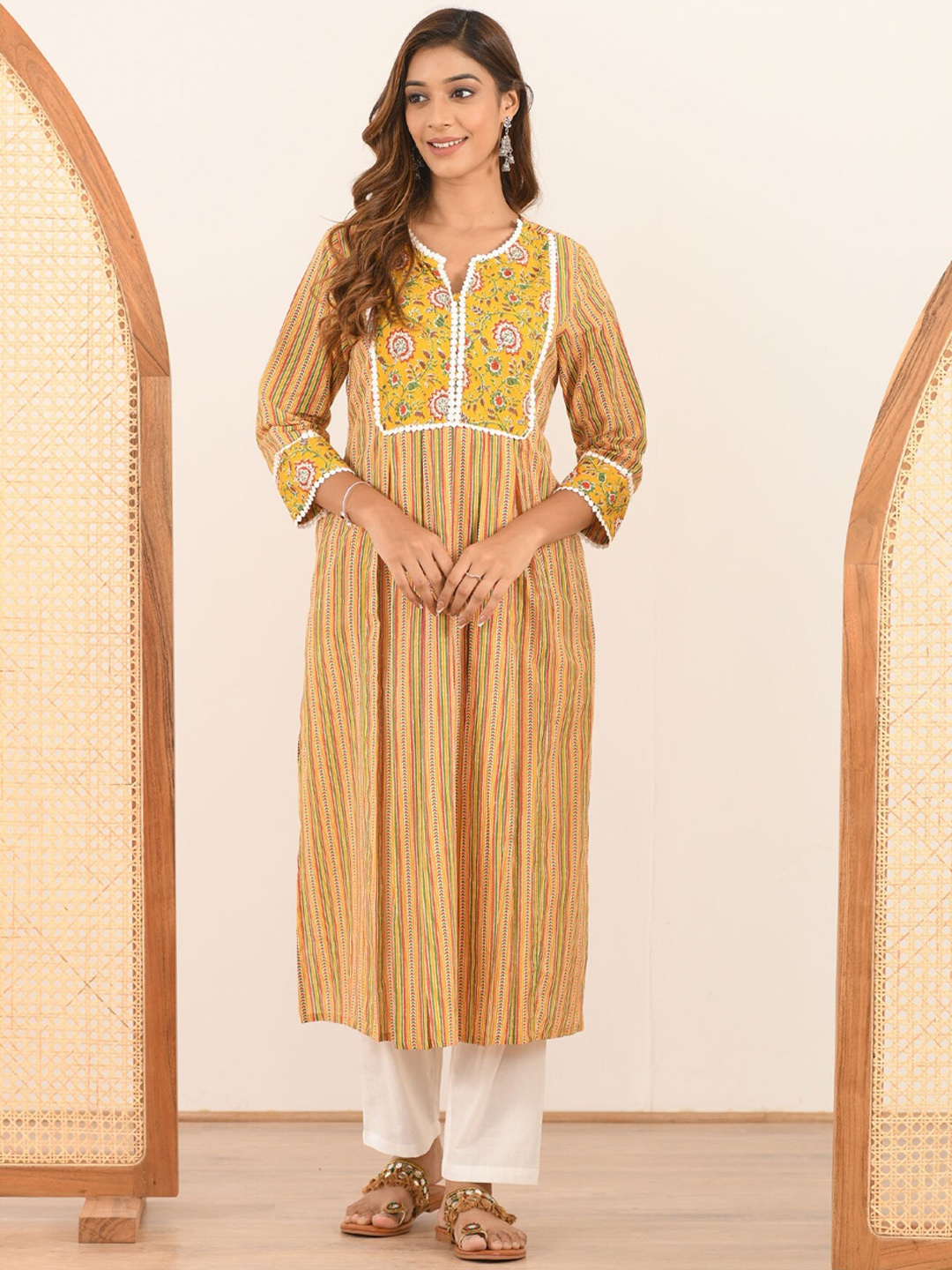 

Aaheli Women Yellow Floral Printed Pure Cotton Kurta with Trousers