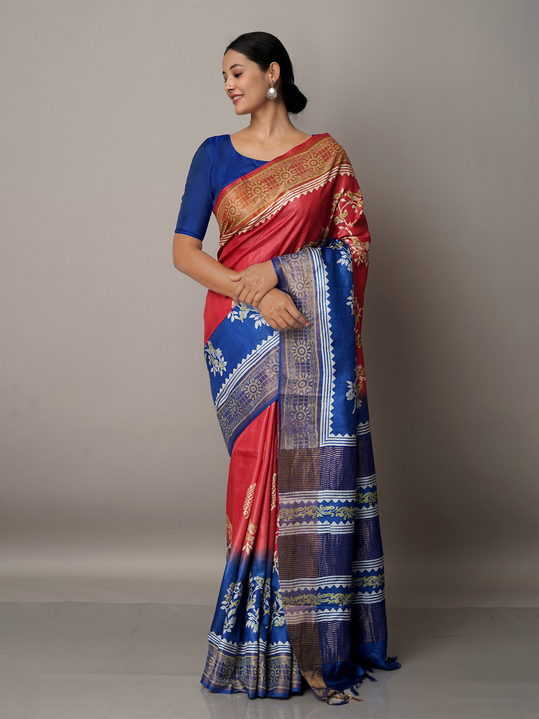 

Unnati Silks Red And Blue Floral Print Zari Pure Silk Tussar Saree