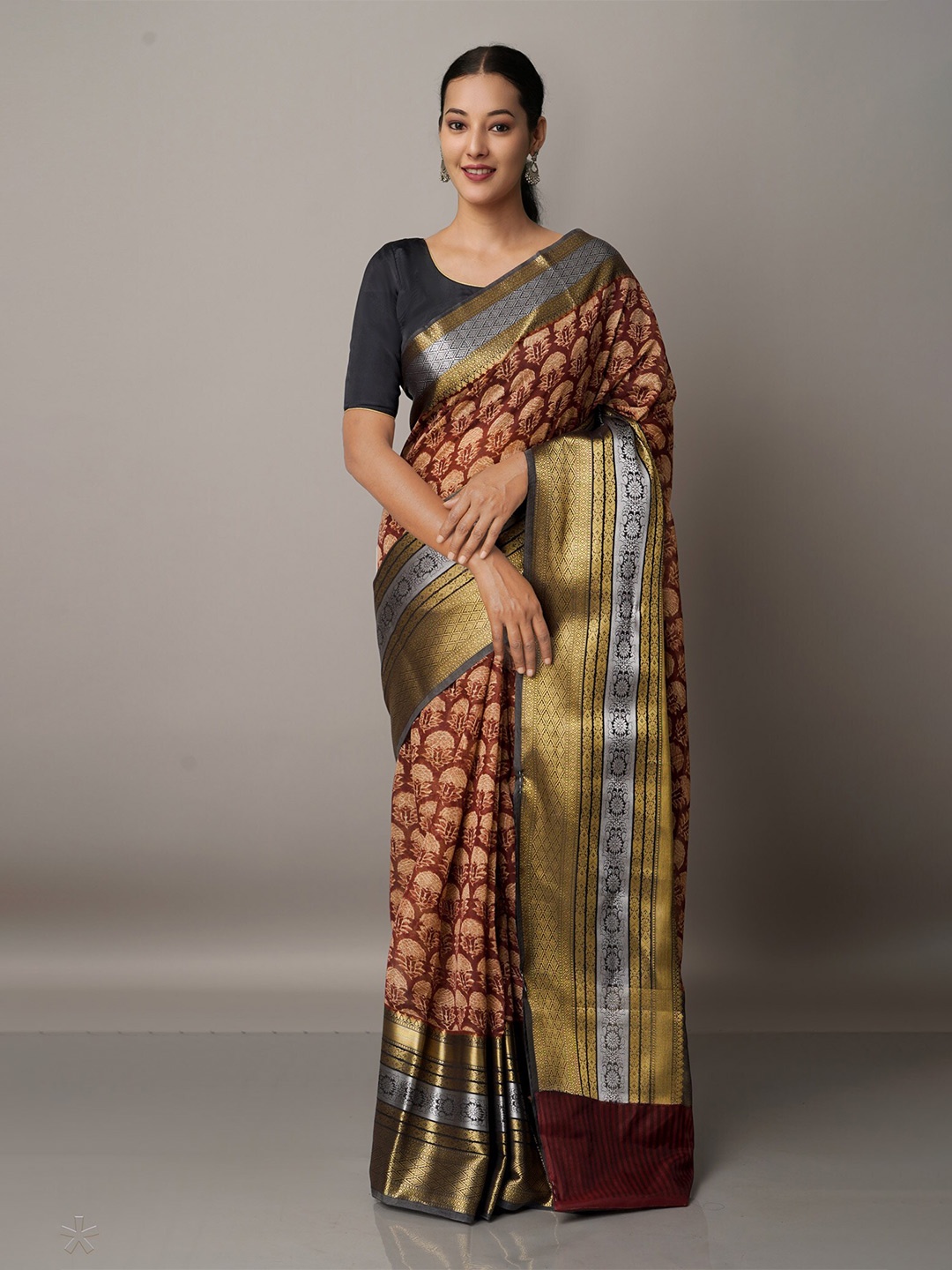 

Unnati Silks Maroon & Gold-Toned Ethnic Motifs Zari Silk Cotton Maheshwari Saree