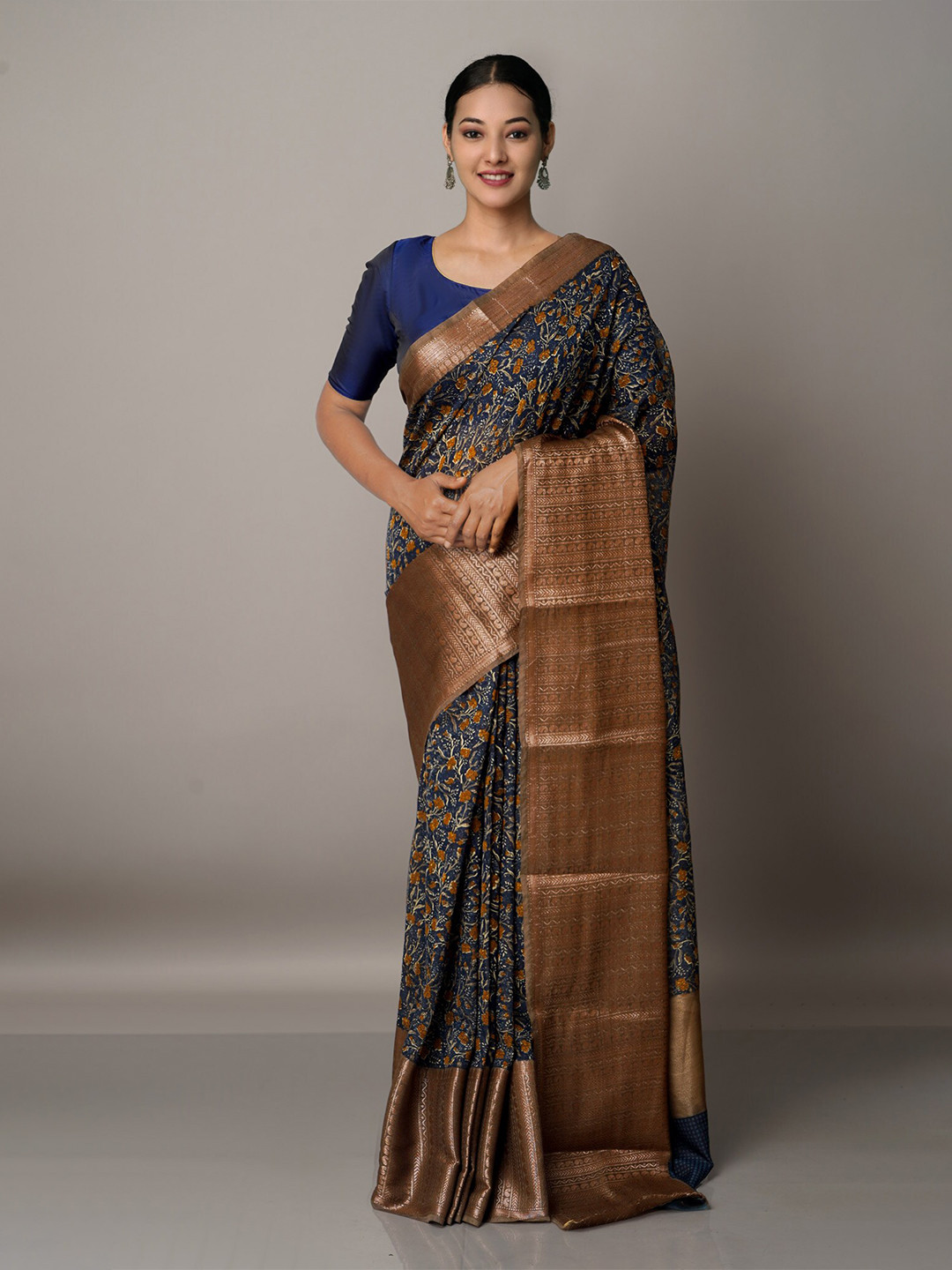 

Unnati Silks Navy Blue & Brown Floral Zari Silk Cotton Maheshwari Saree