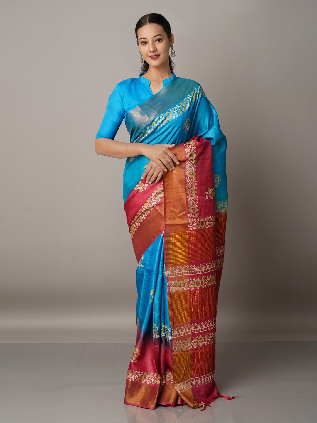 

Unnati Silks Blue & Red Floral Zari Pure Silk Tussar Saree