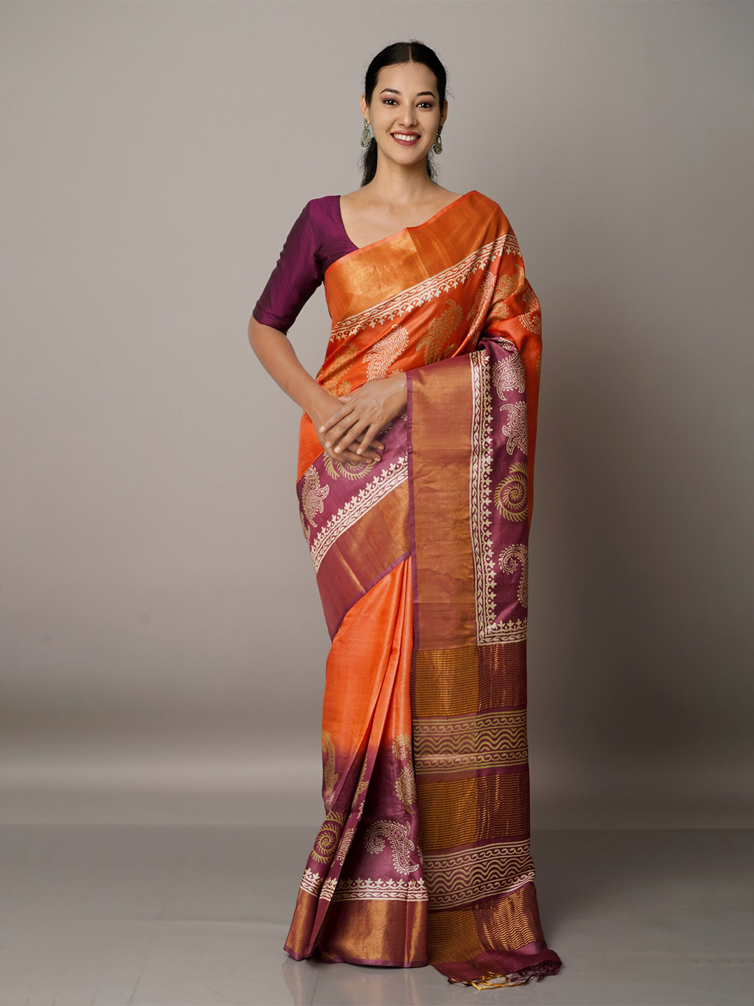 

Unnati Silks Orange & Purple Ethnic Motifs Pure Silk Tussar Saree
