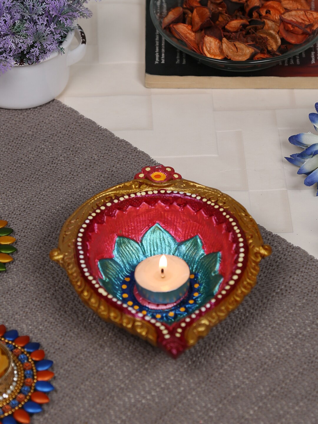 

Aapno Rajasthan Red & Blue Terracotta Diya Candle Holder