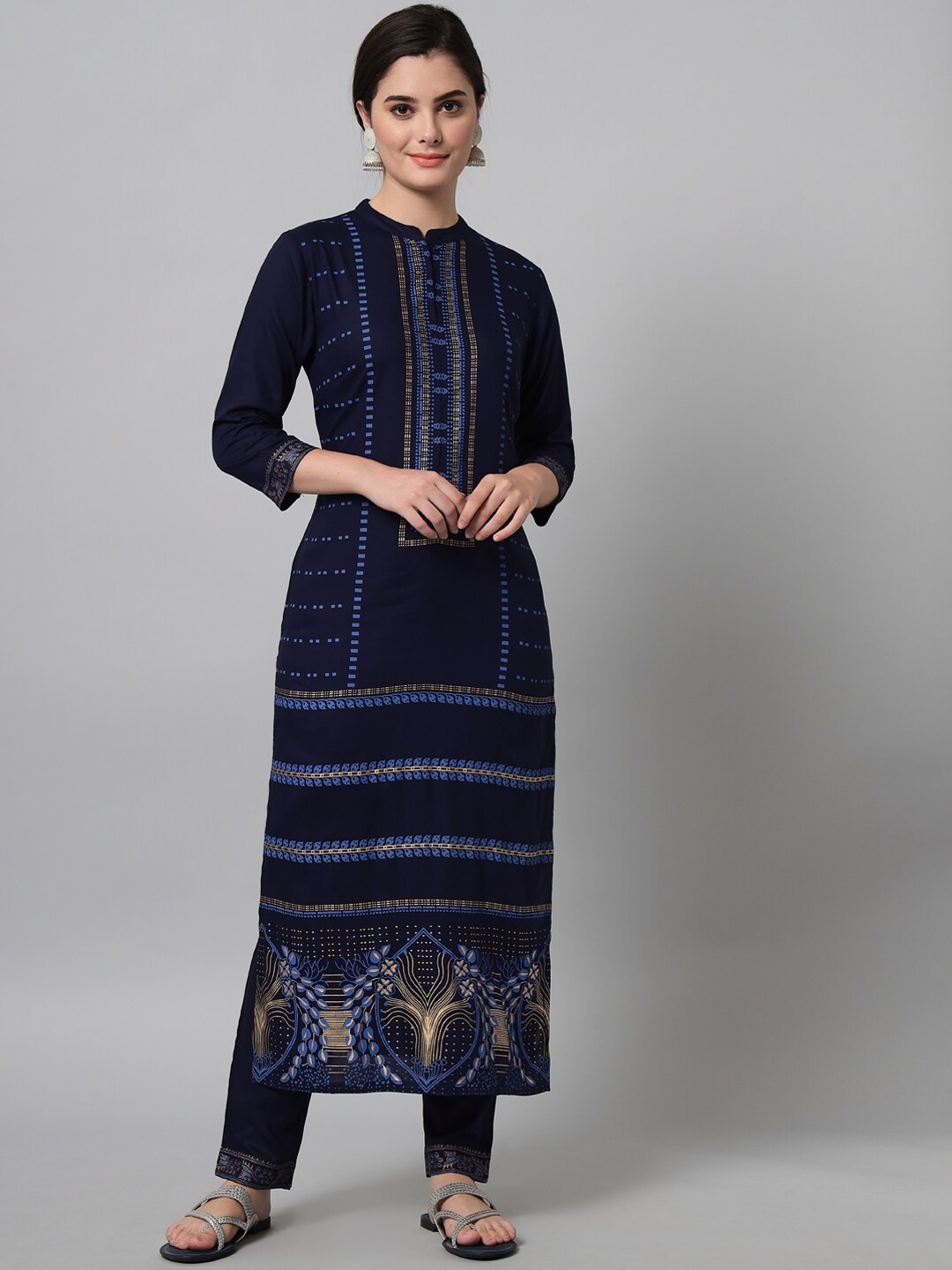 

Tulsattva Women Navy Blue Ethnic Motifs Printed Kurta with Trousers