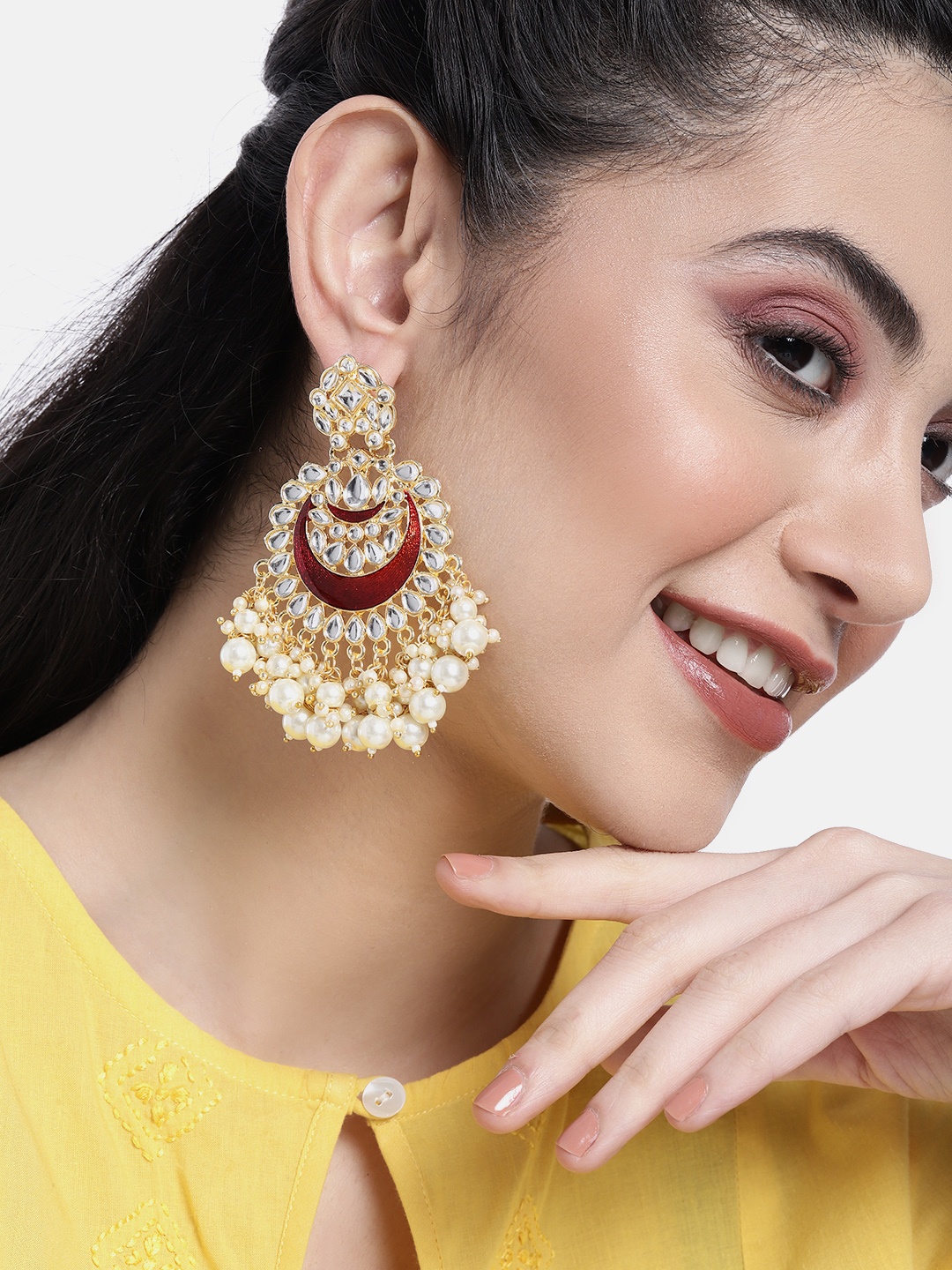 

Peora Gold-Plated Crescent Shaped Chandbalis Earrings