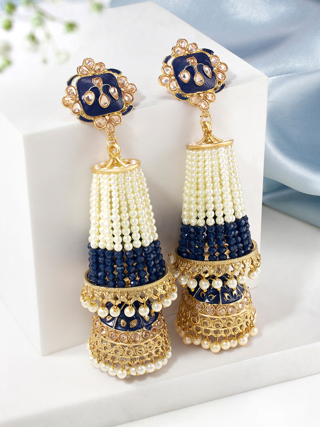 

Peora Blue & Off White Dome Shaped Stone Studded & Beaded Jhumkas Earrings