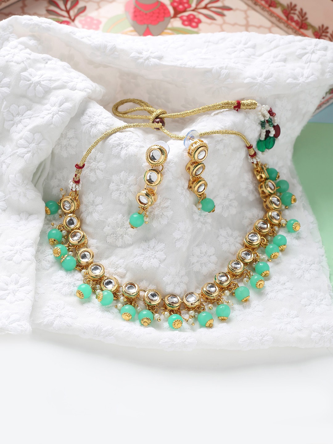 

MAD CLUB Gold-Plated White & Green Kundan Studded & Beaded Jewellery Set