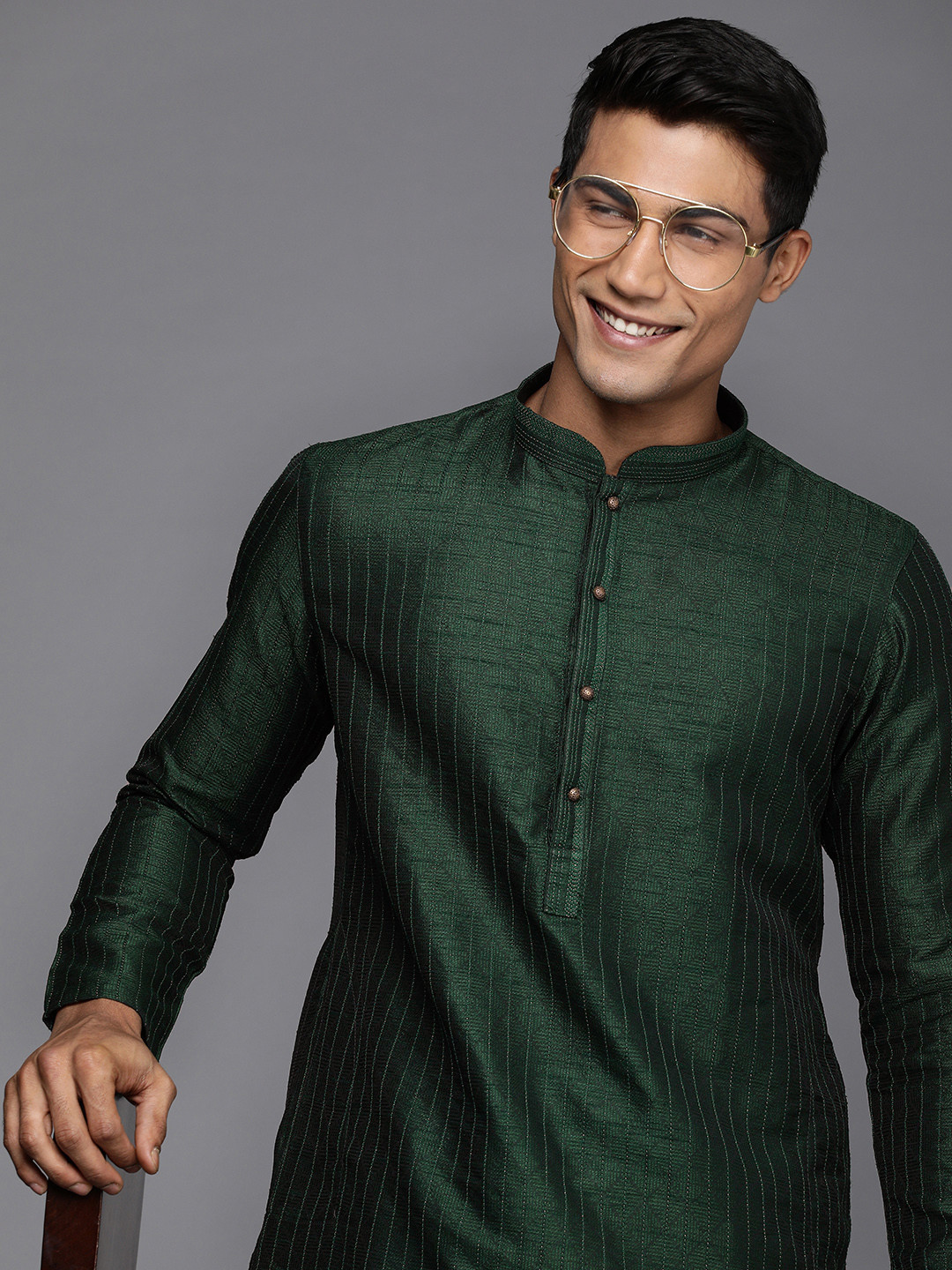 

Manyavar Men Green Woven Design Kurta with Churidar