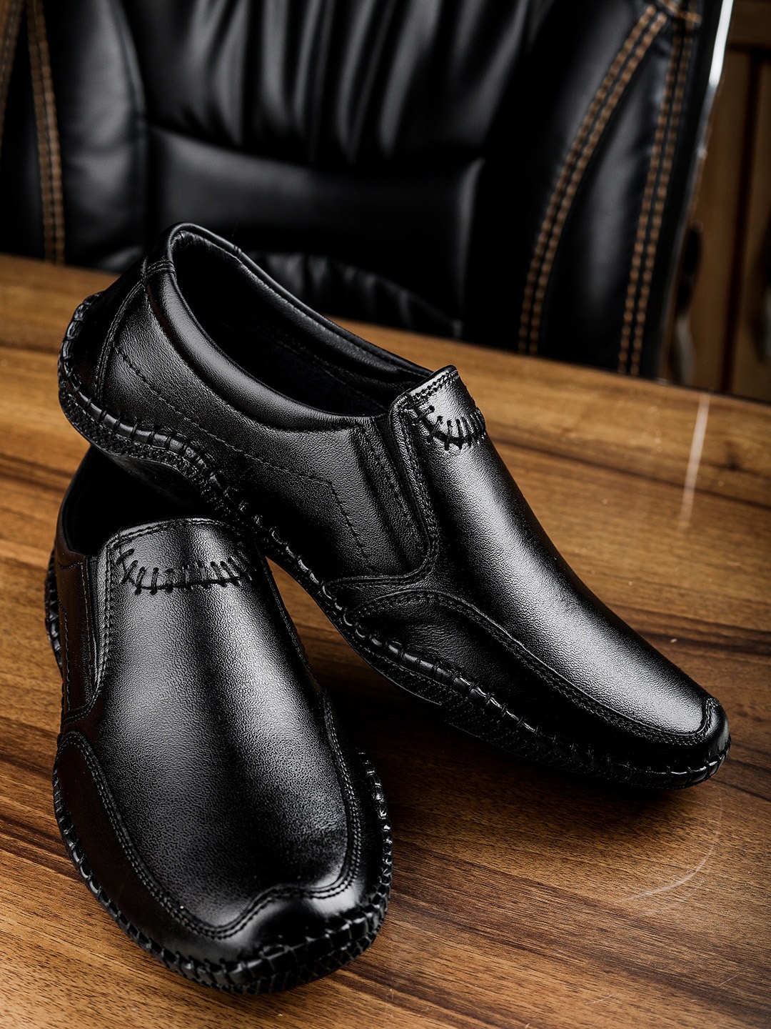 

Mactree Men Black Solid Leather Formal Loafers