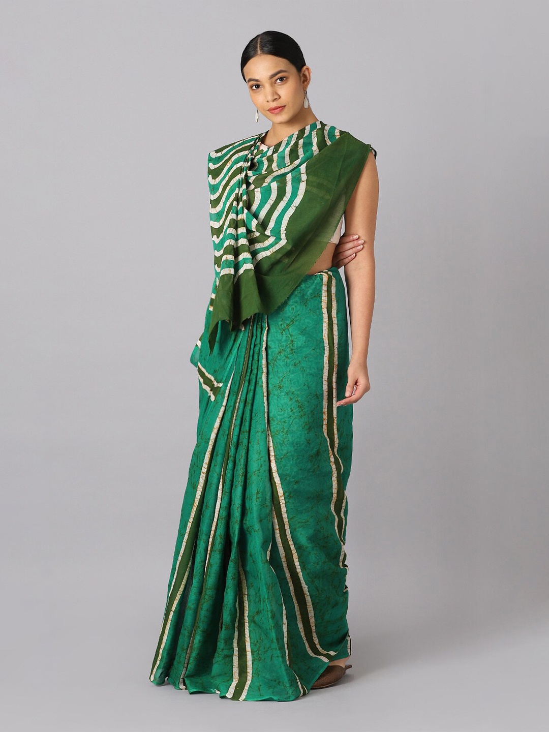 

Taneira Green And White Striped Pure Cotton Saree