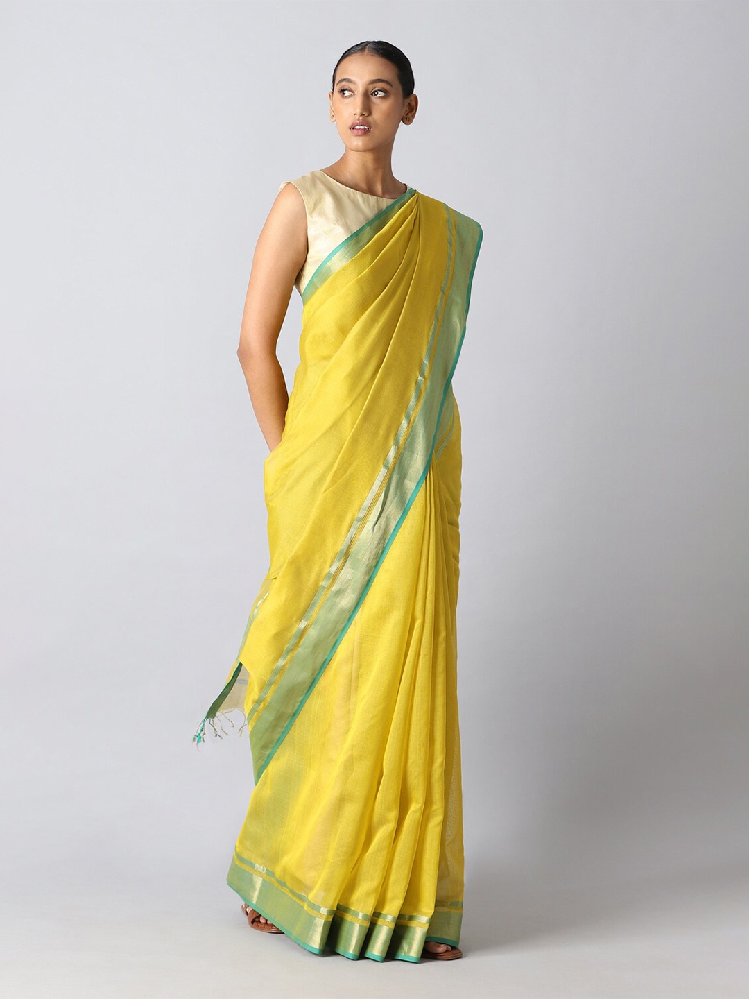 

Taneira Yellow & Green Zari Silk Cotton Maheshwari Saree