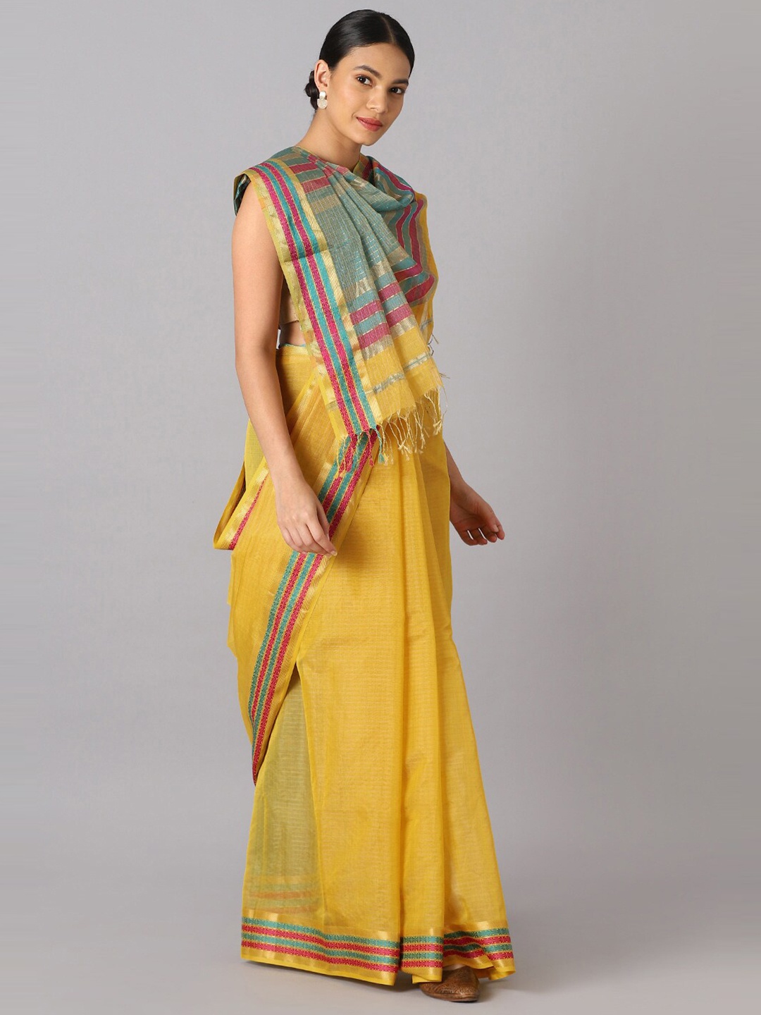 

Taneira Yellow & Green Zari Tissue Maheshwari Saree