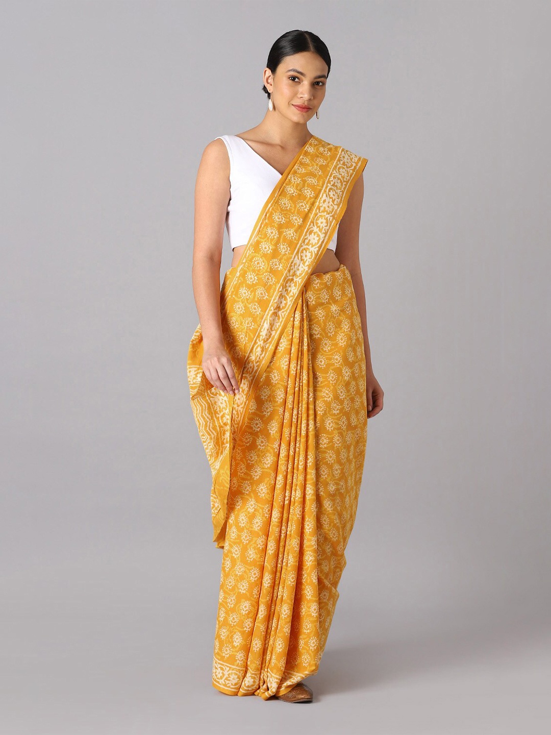 

Taneira Yellow & White Floral Pure Cotton Saree