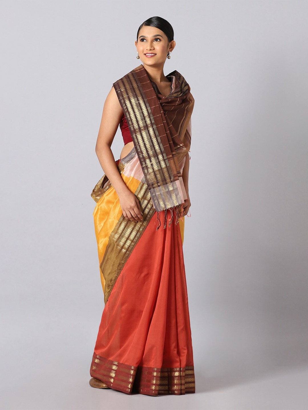 

Taneira Orange & Brown Zari Silk Cotton Maheshwari Saree