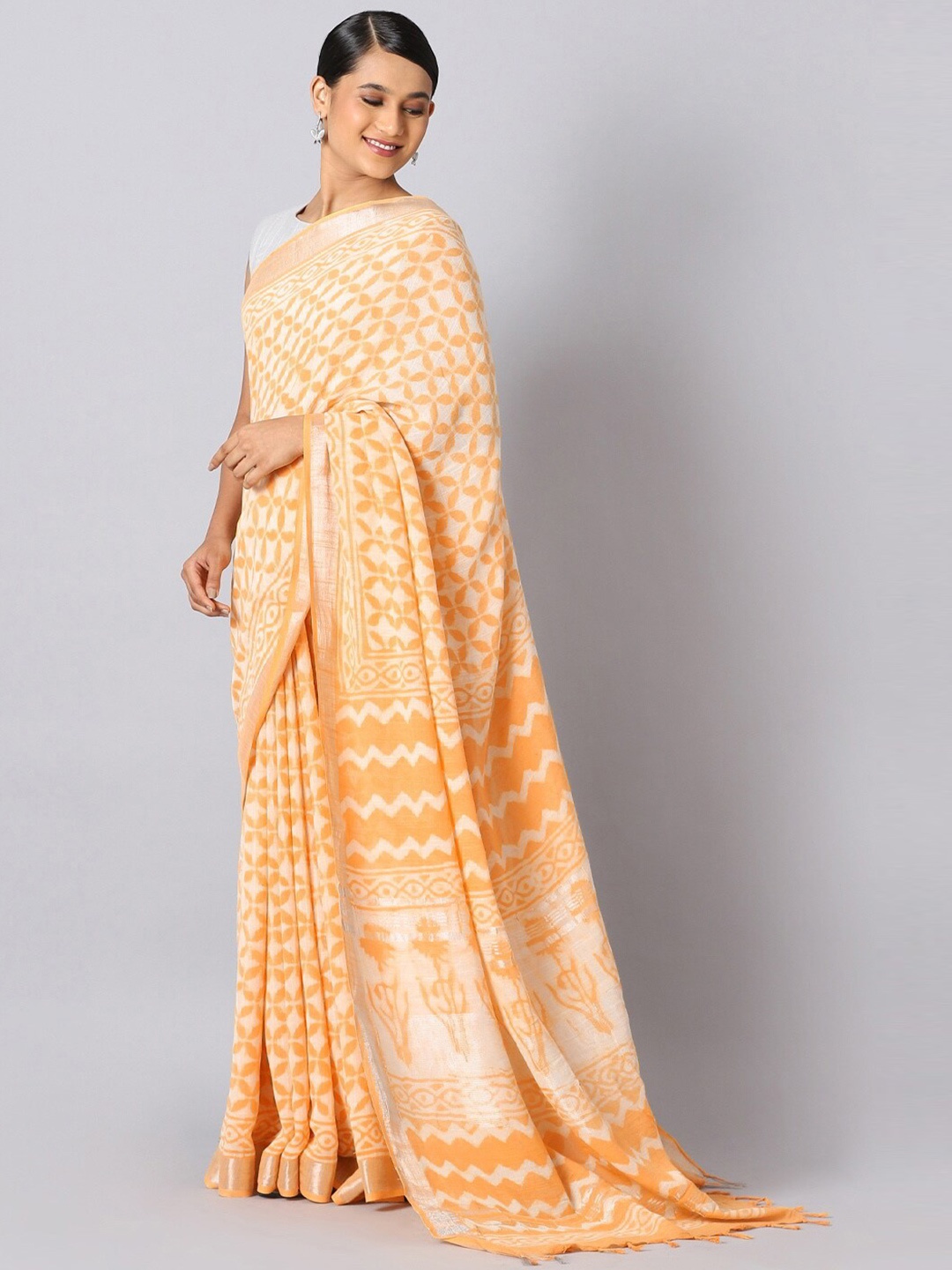 

Taneira Orange & Gold-Toned Ethnic Motifs Zari Linen Blend Bagru Saree