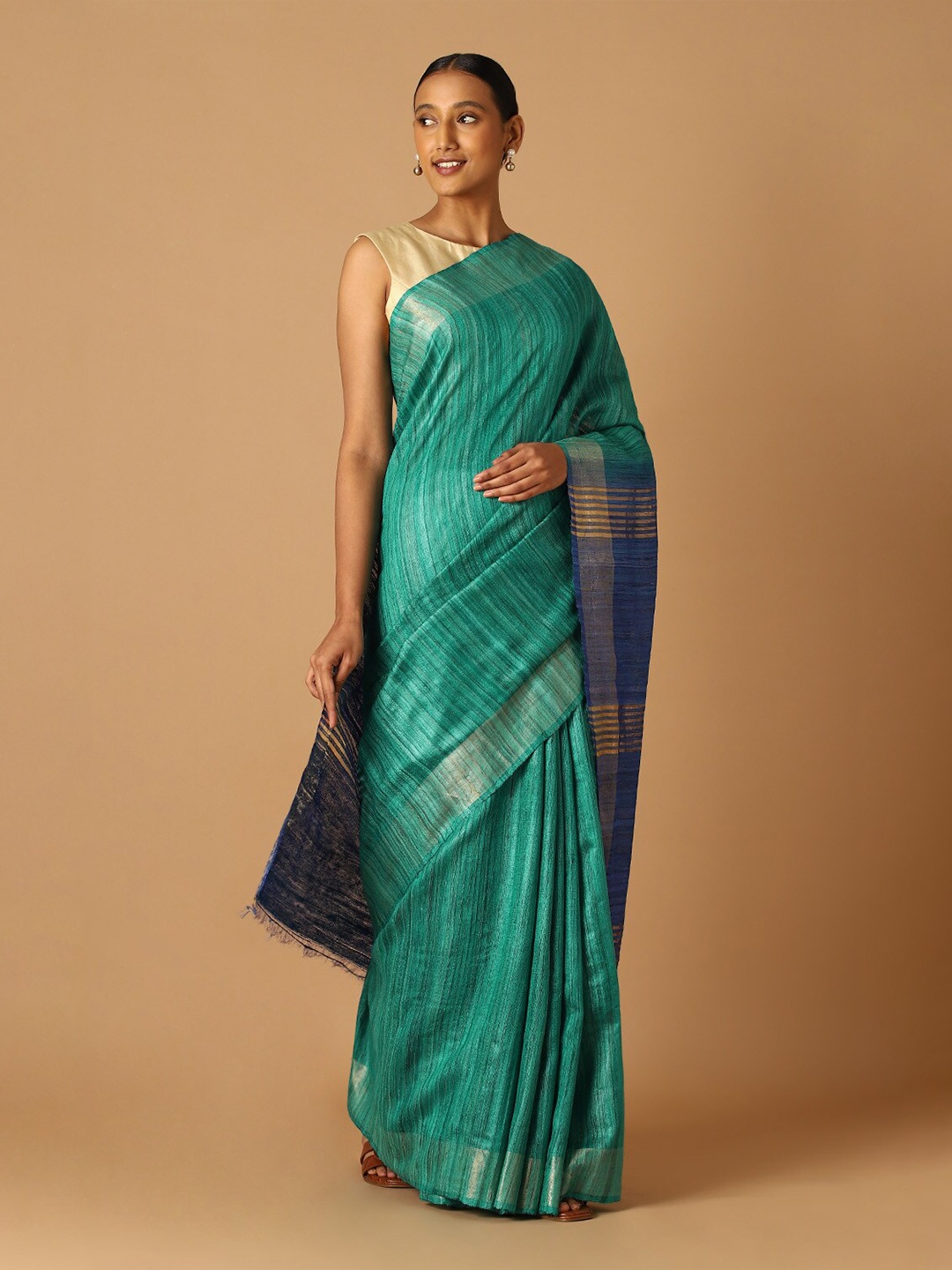 

Taneira Green & Blue Striped Zari Pure Silk Bhagalpuri Saree