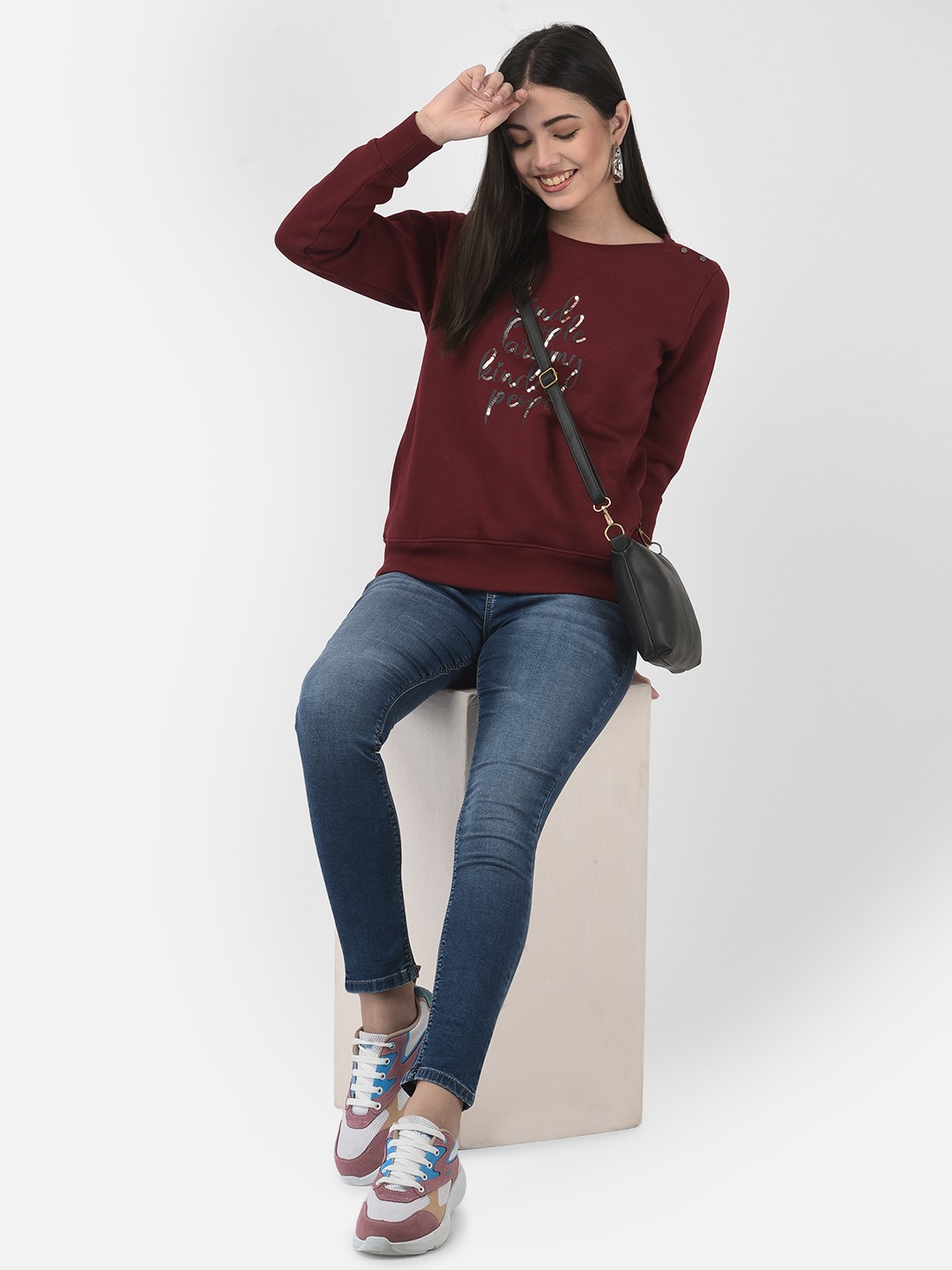

Crimsoune Club Women Maroon Embellished Typographic Sweatshirt