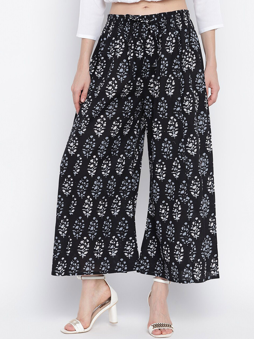 

Aawari Women Black Floral Printed High-Rise Trousers